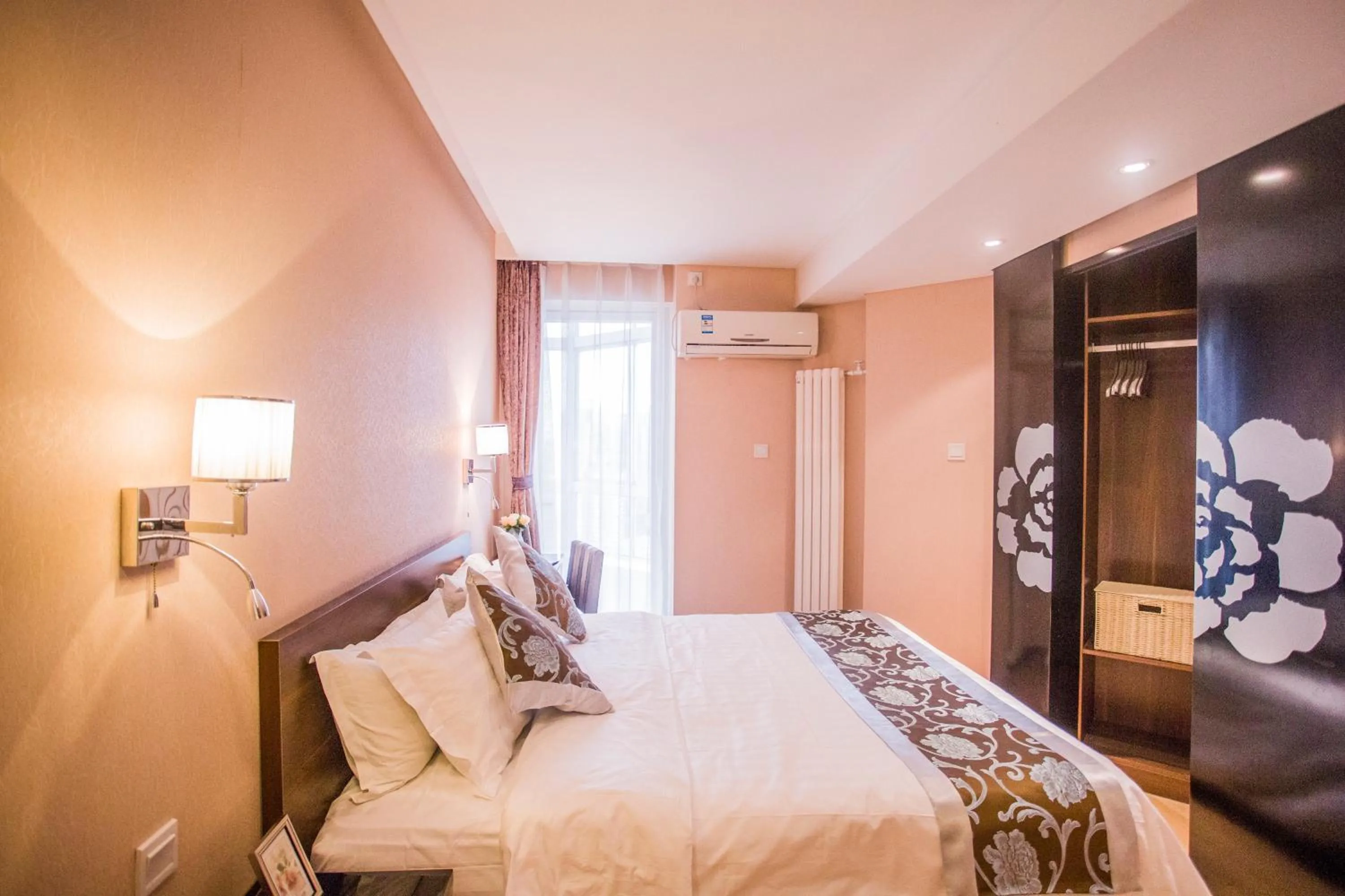 Bed in Guangyao Service Apartment Beijing Ritan