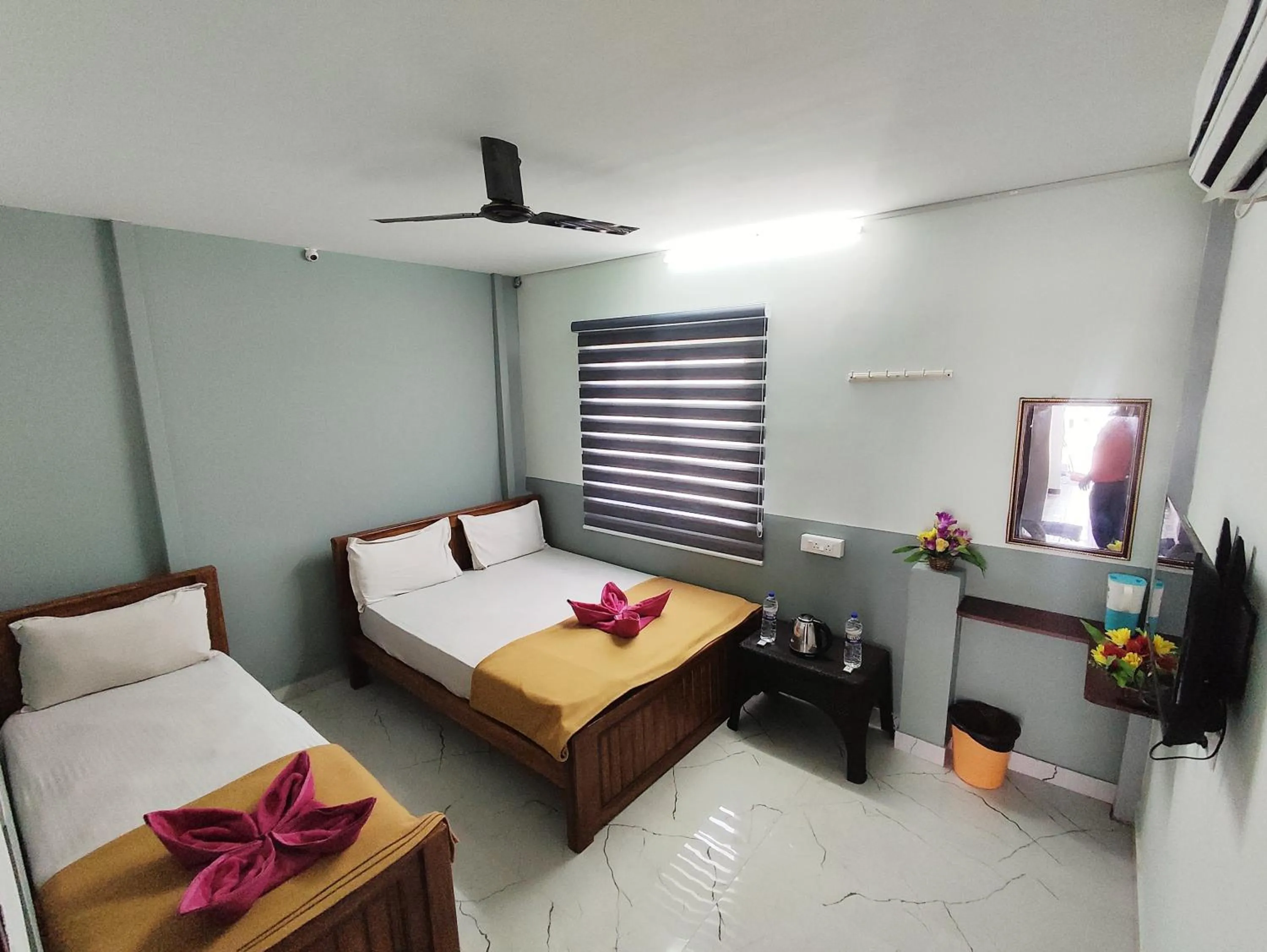 Bed in Sri Aksha Residency