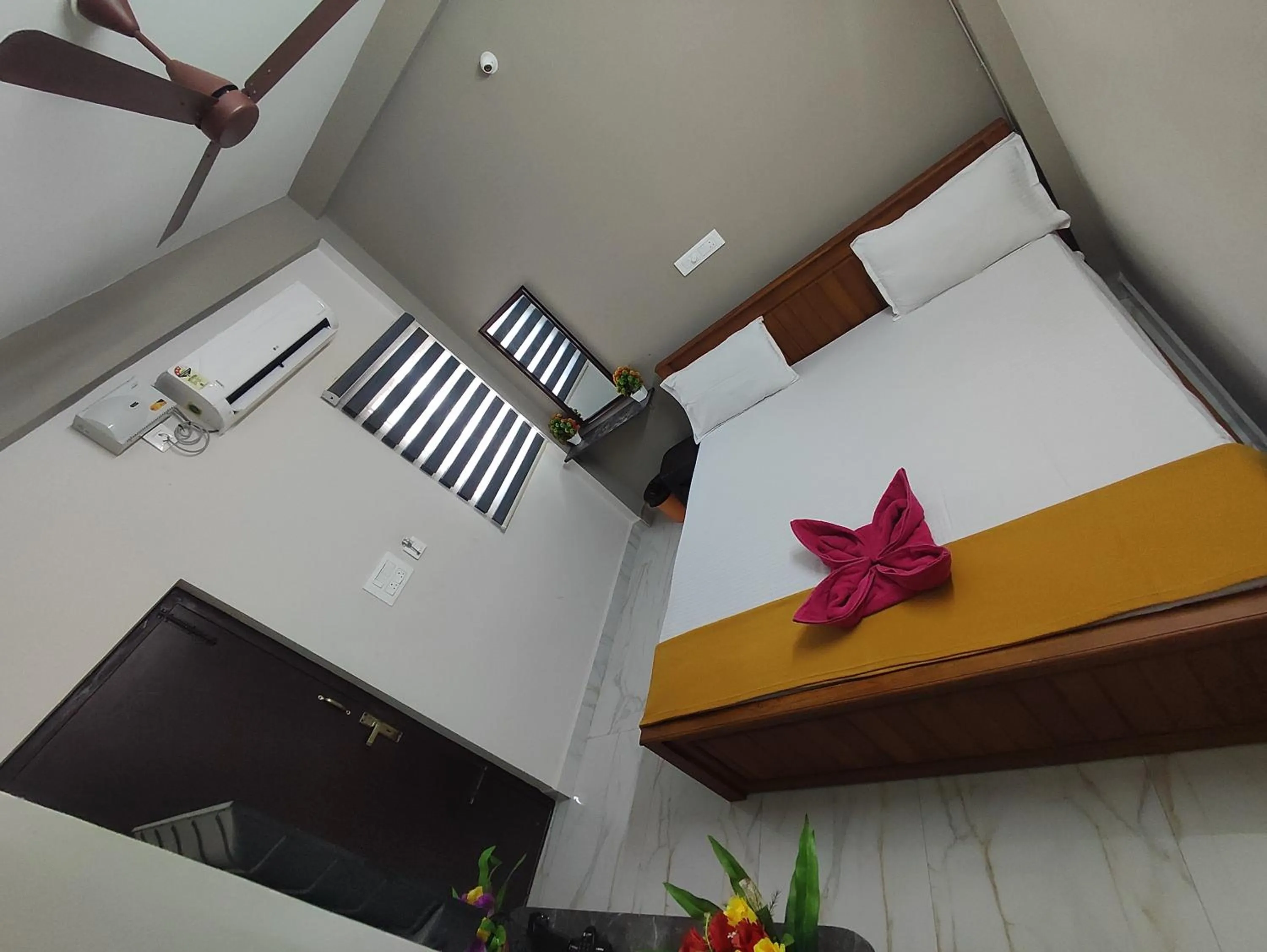 Bed in Sri Aksha Residency