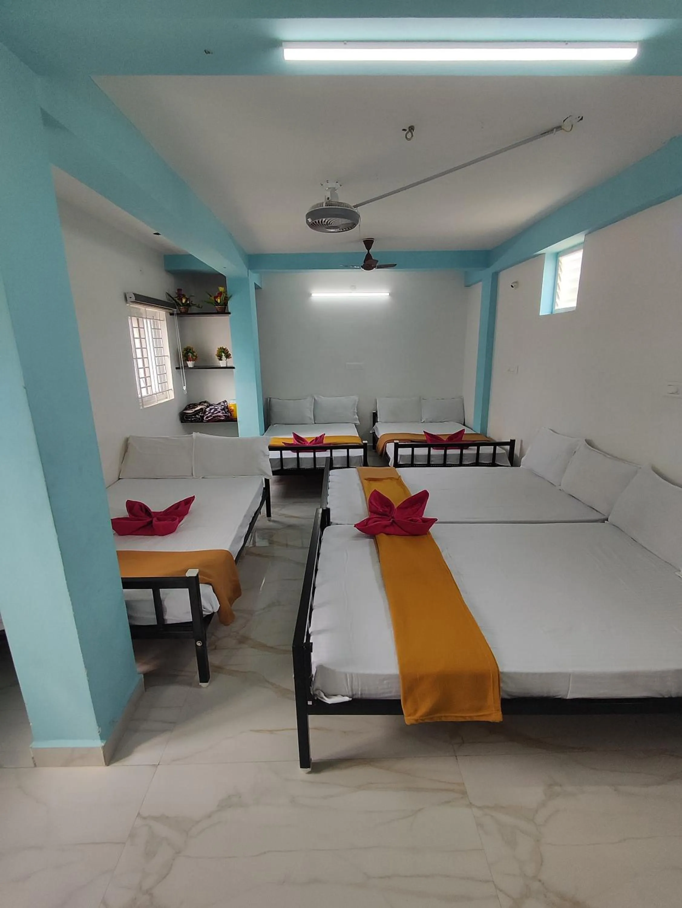 Bed in Sri Aksha Residency