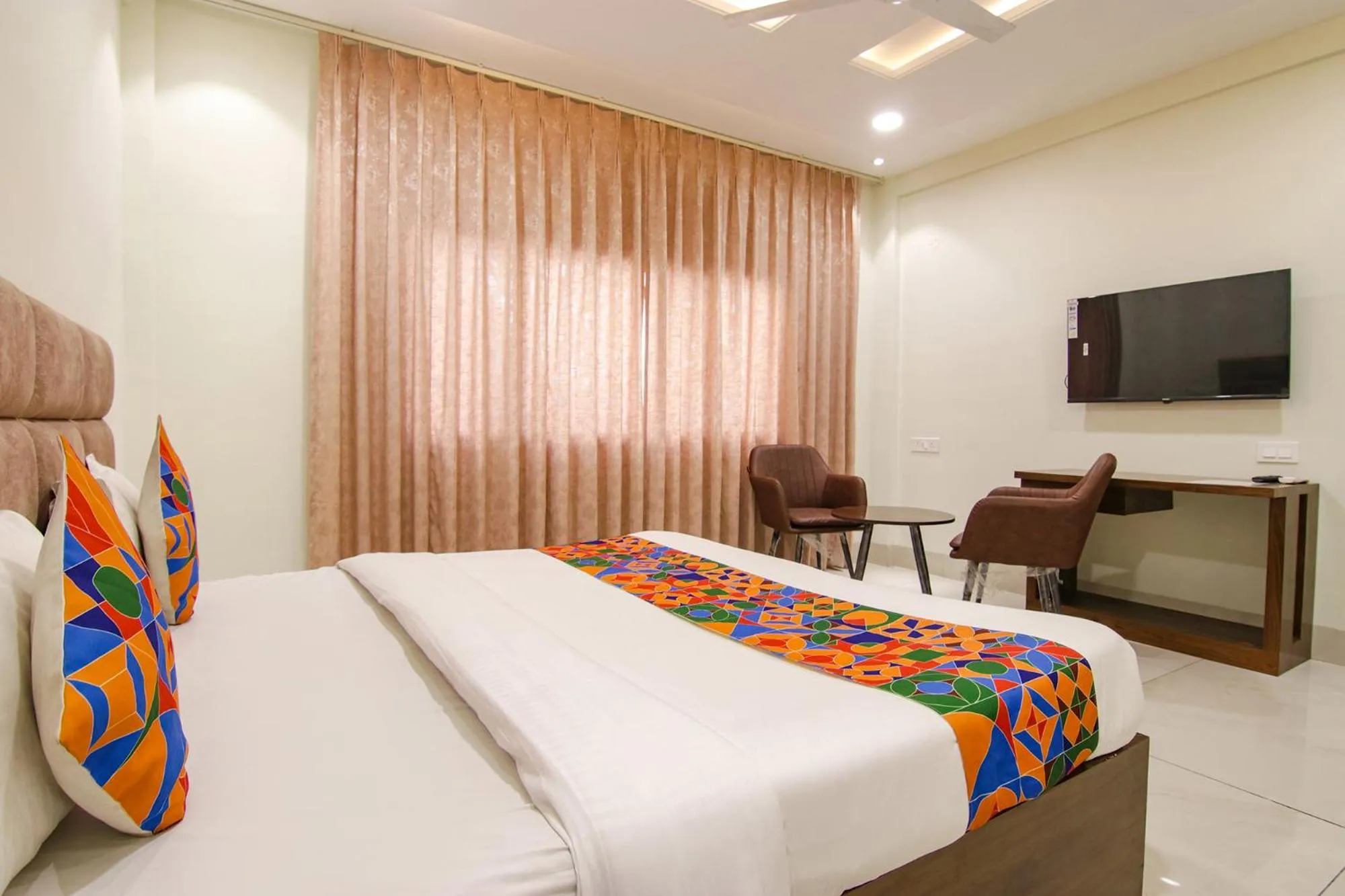 Bed in FabHotel Prism Grand