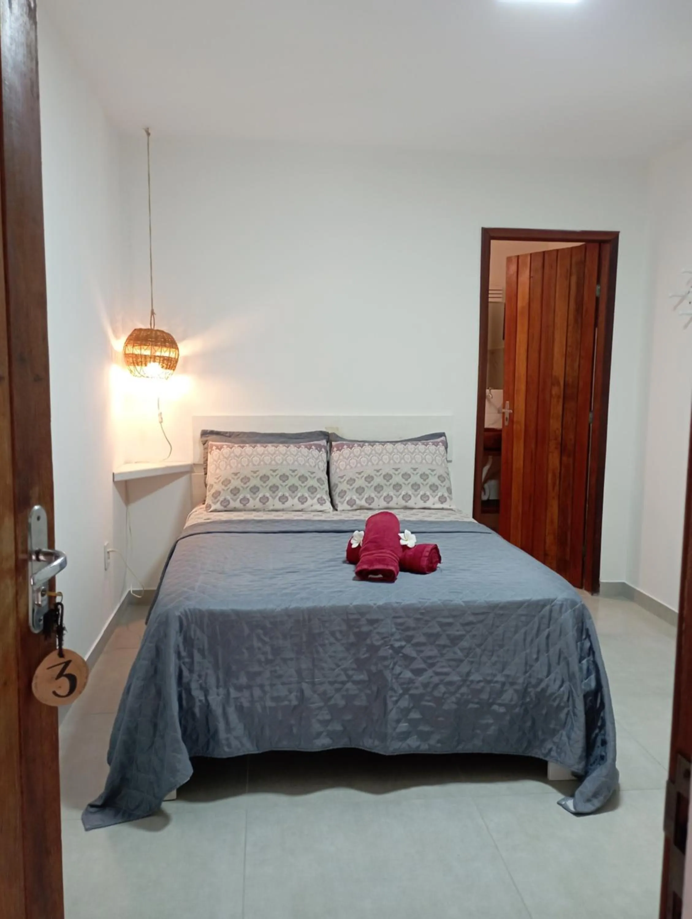 Bed in Pousada Casa Do Cocotier