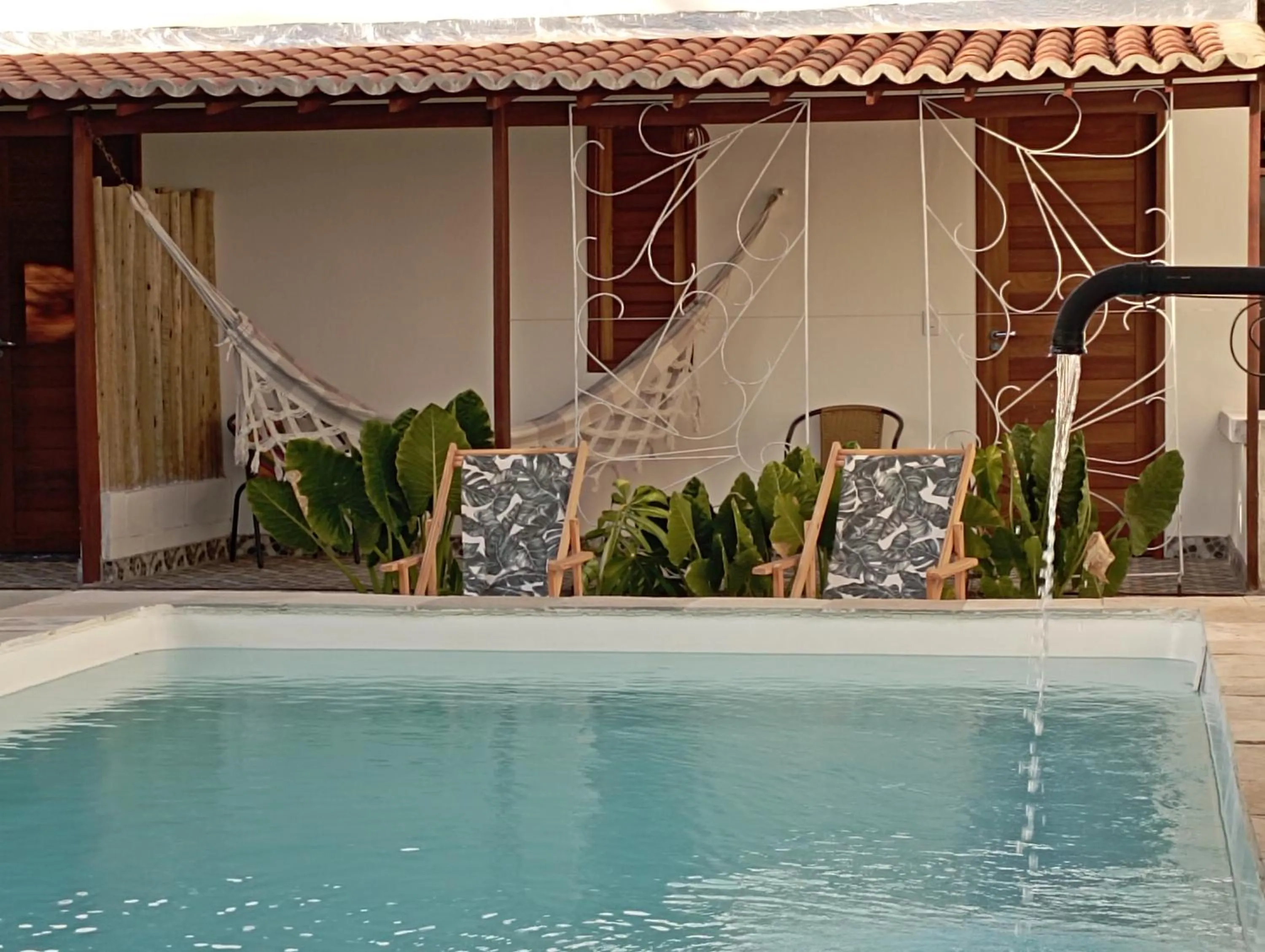 Swimming pool in Pousada Casa Do Cocotier