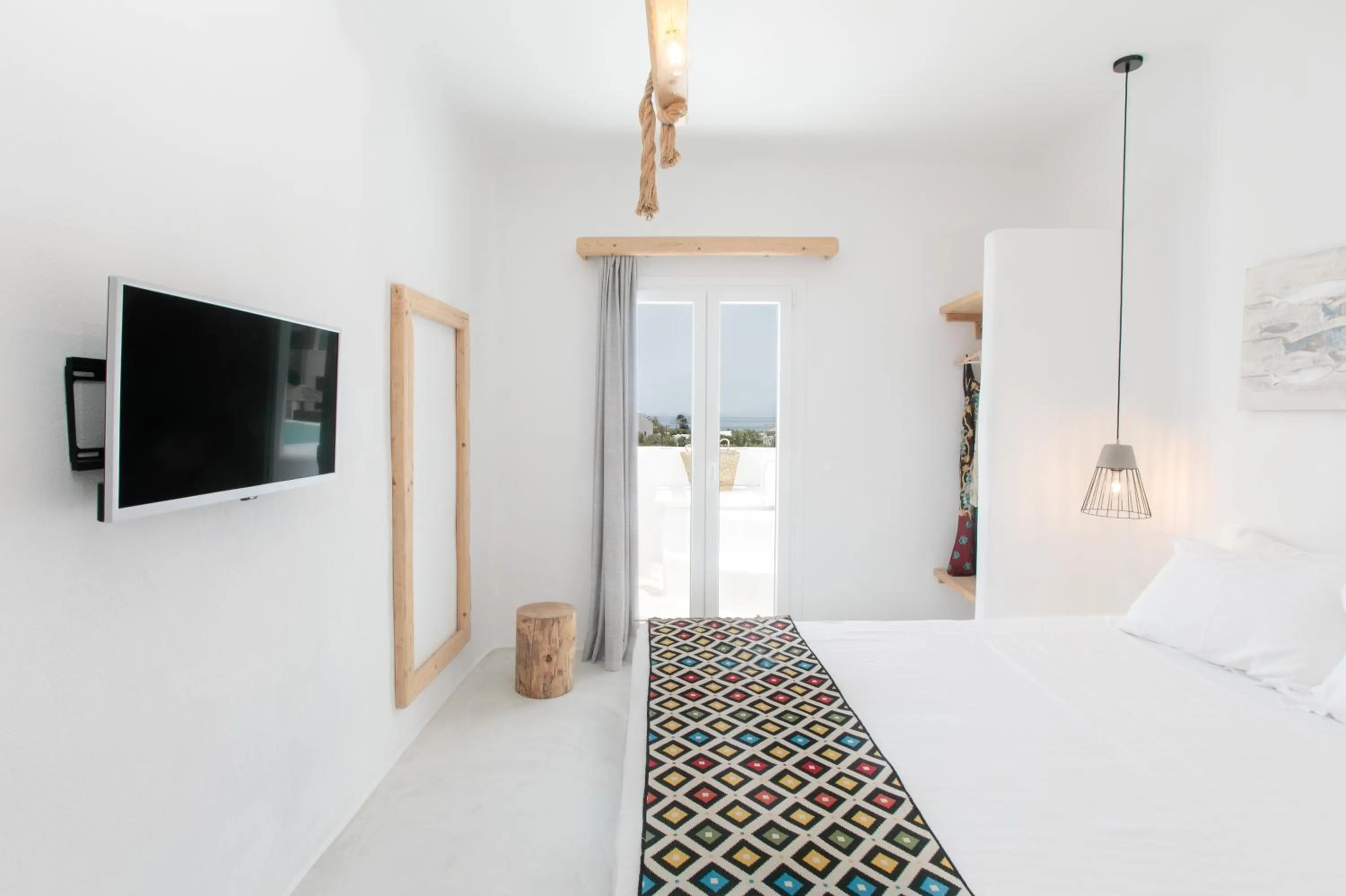 Bed in Irida Vacation Suites