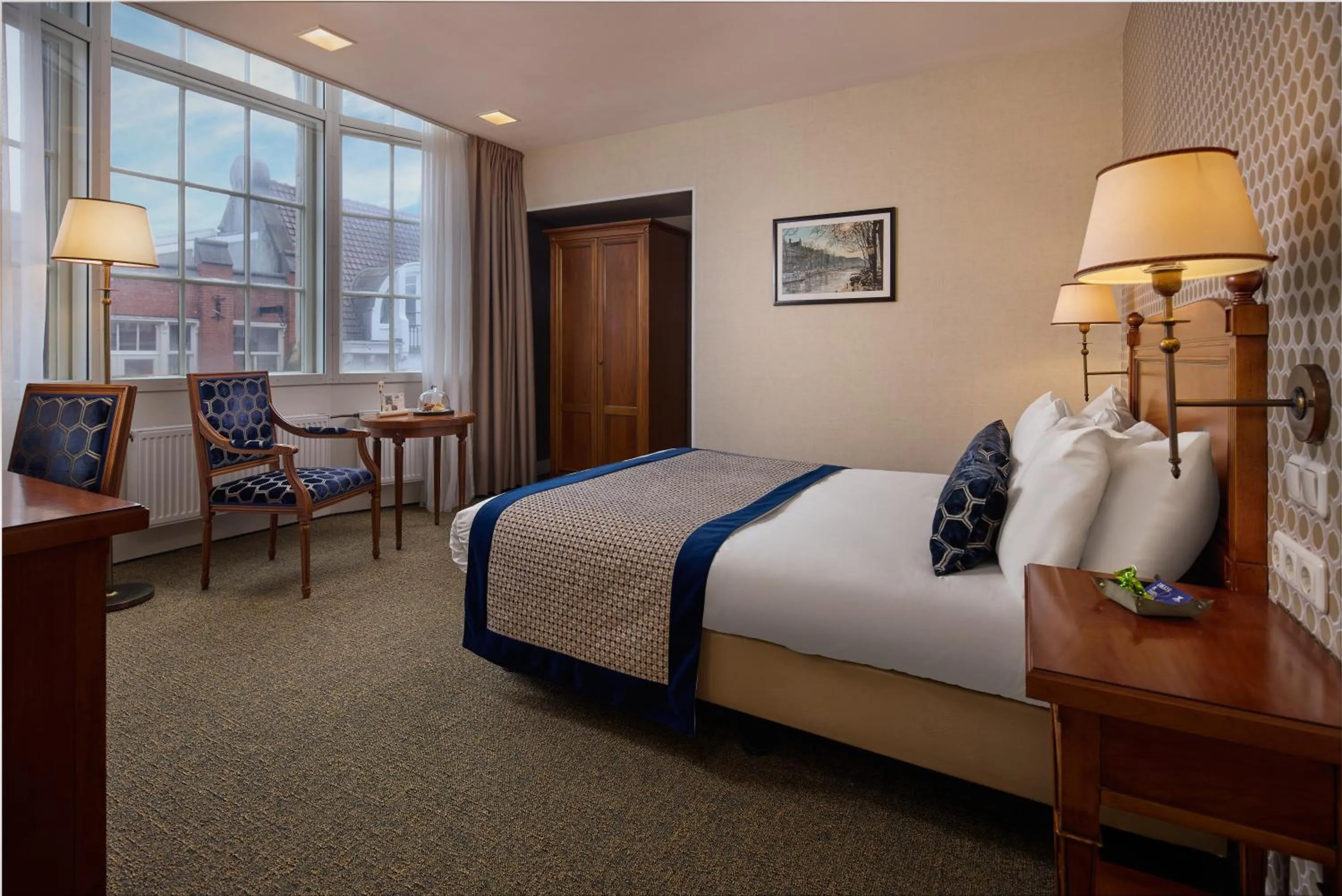 Bed in Dikker & Thijs Hotel