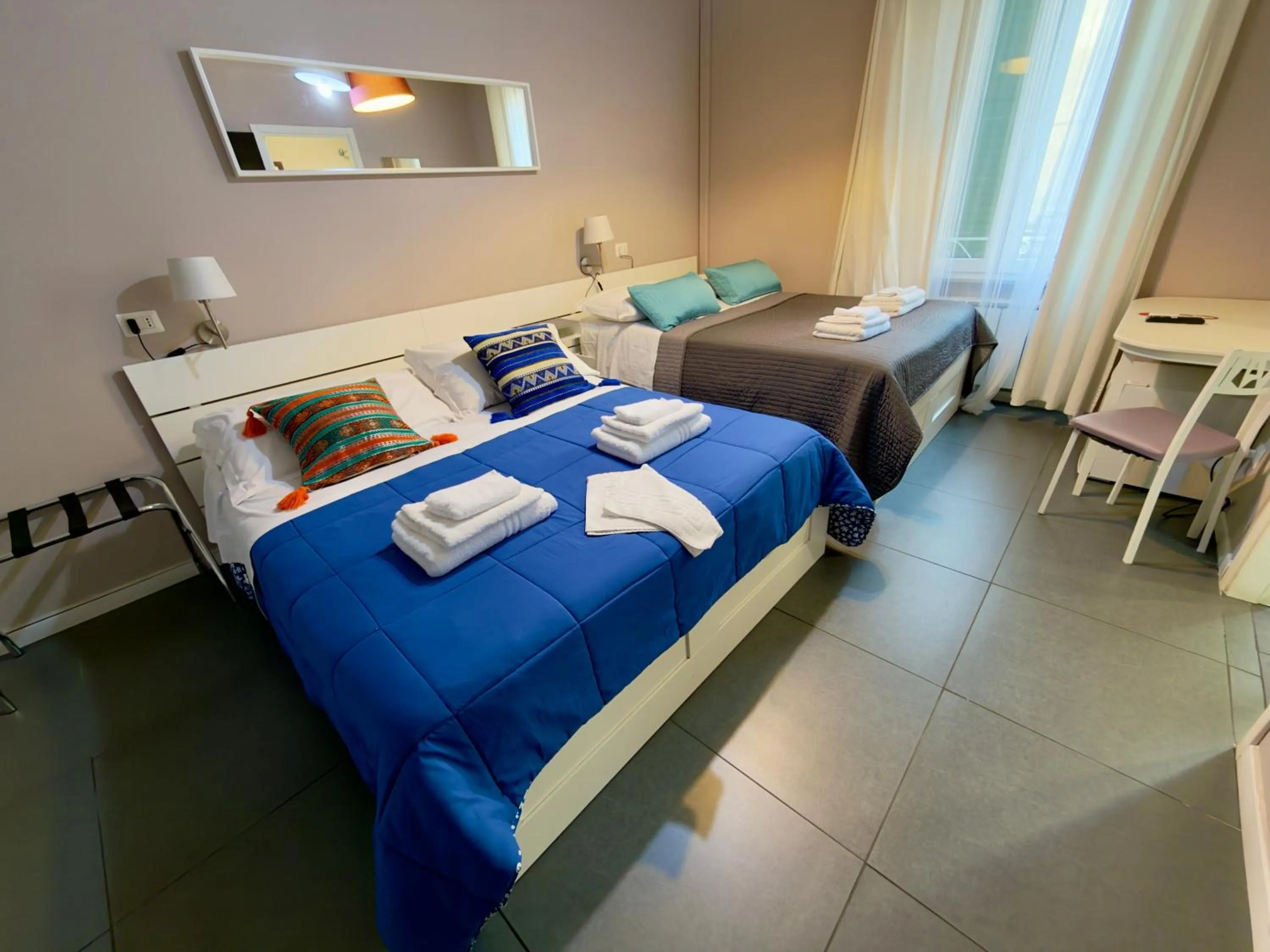 Bed in Le Due Civette Roma