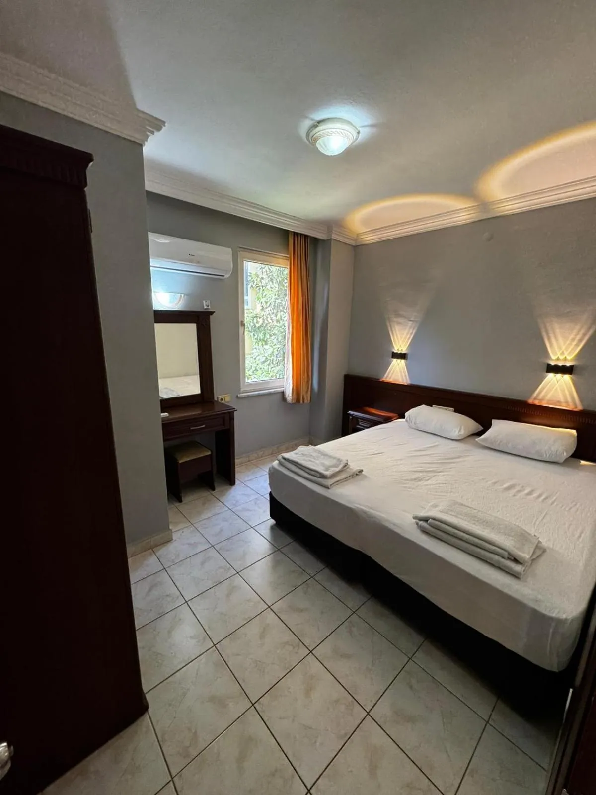 Bed in Rose Garden Apart Hotel