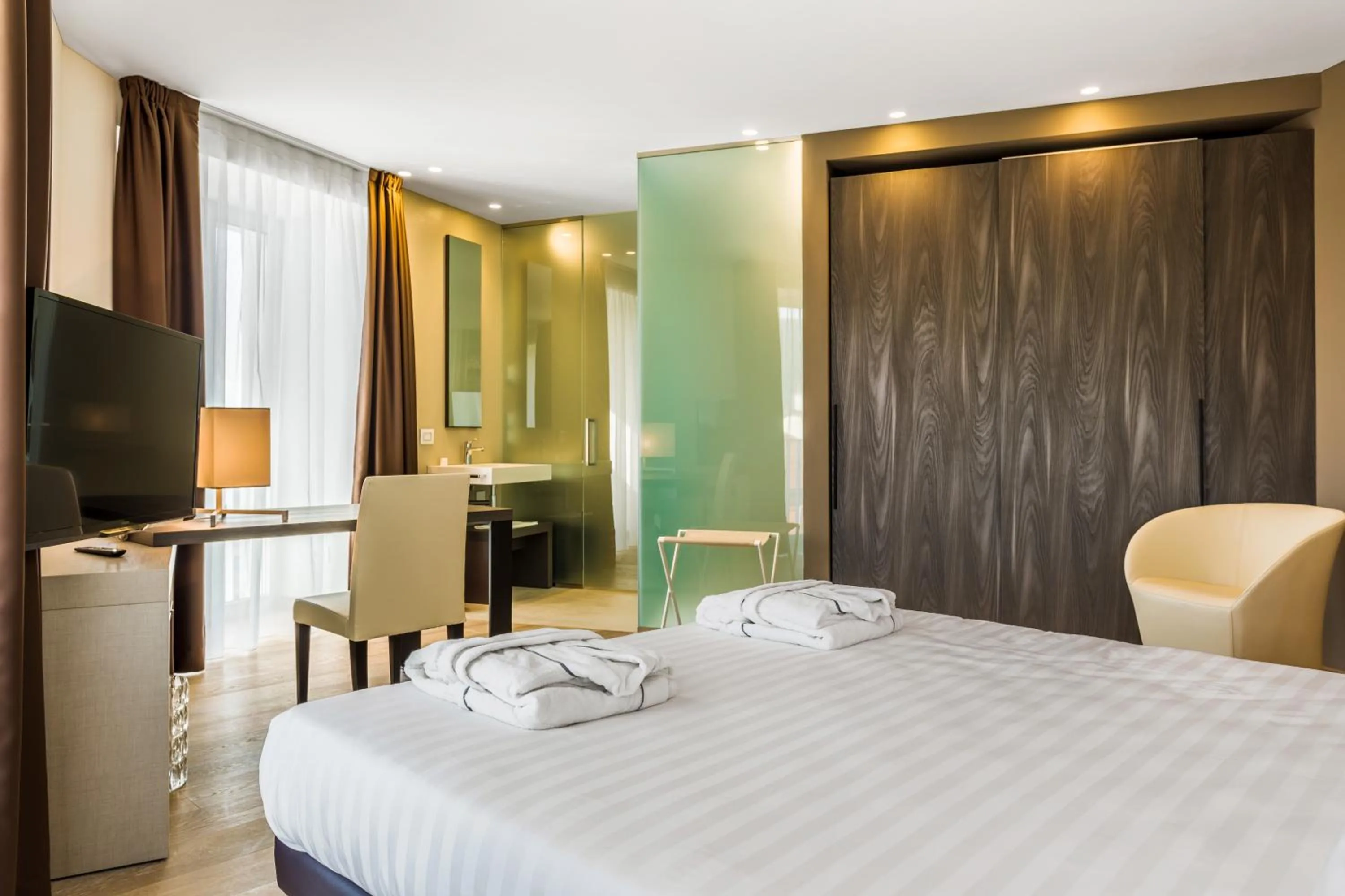 Bed in Suites Hotel Astor