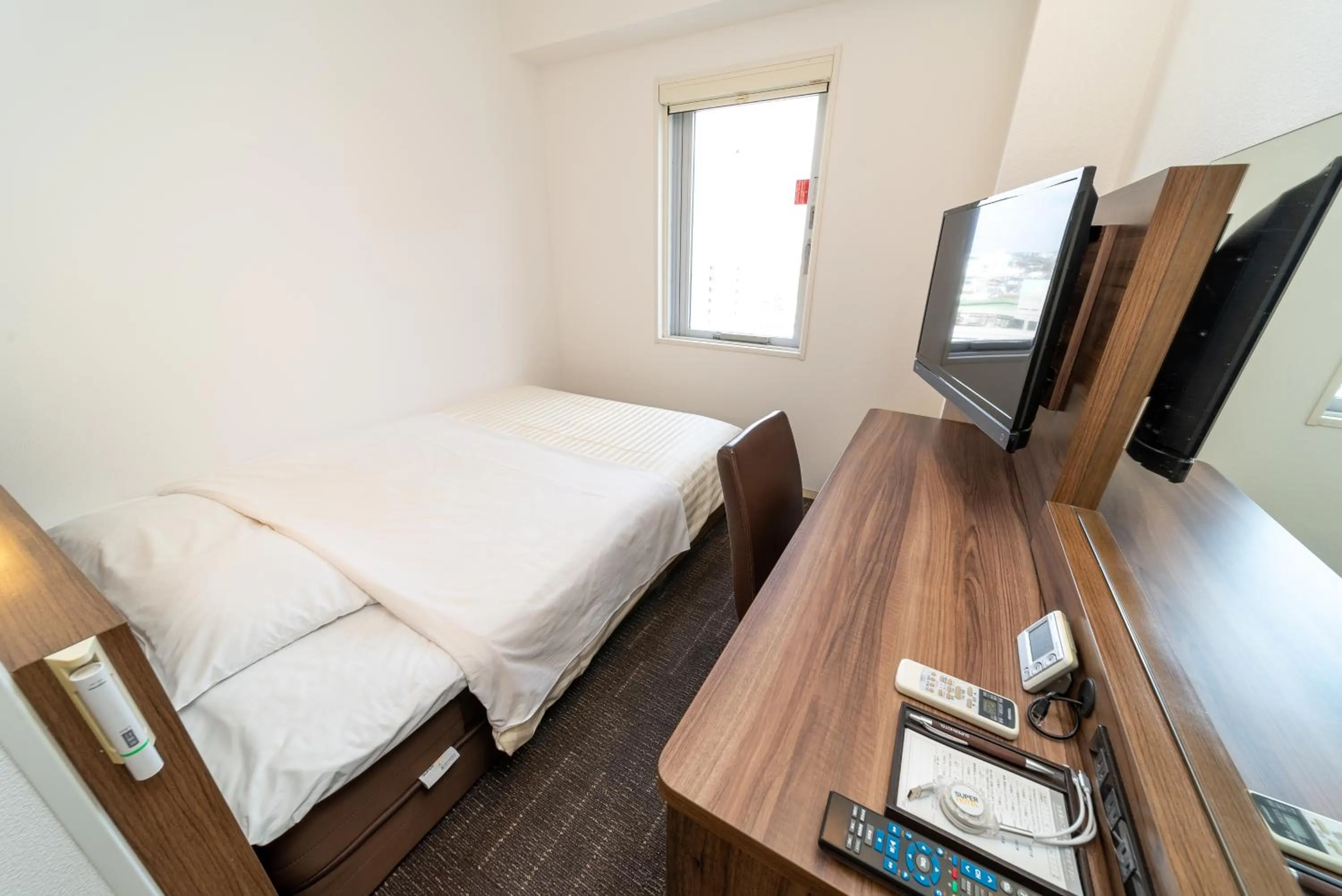 Bed in Super Hotel Tokyo JR Tachikawa Kitaguchi