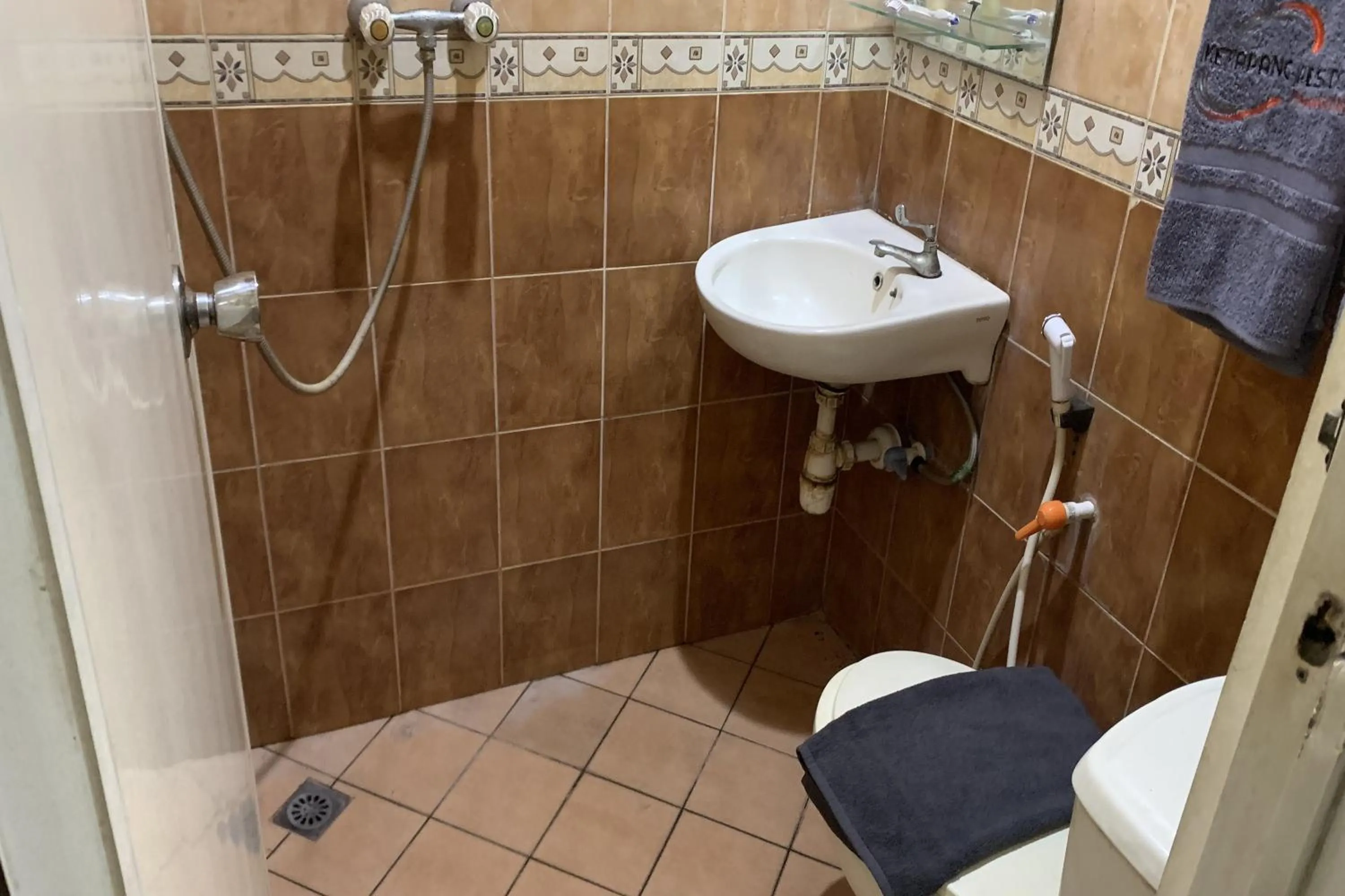 Bathroom in Ketapang Residence Powered Nature