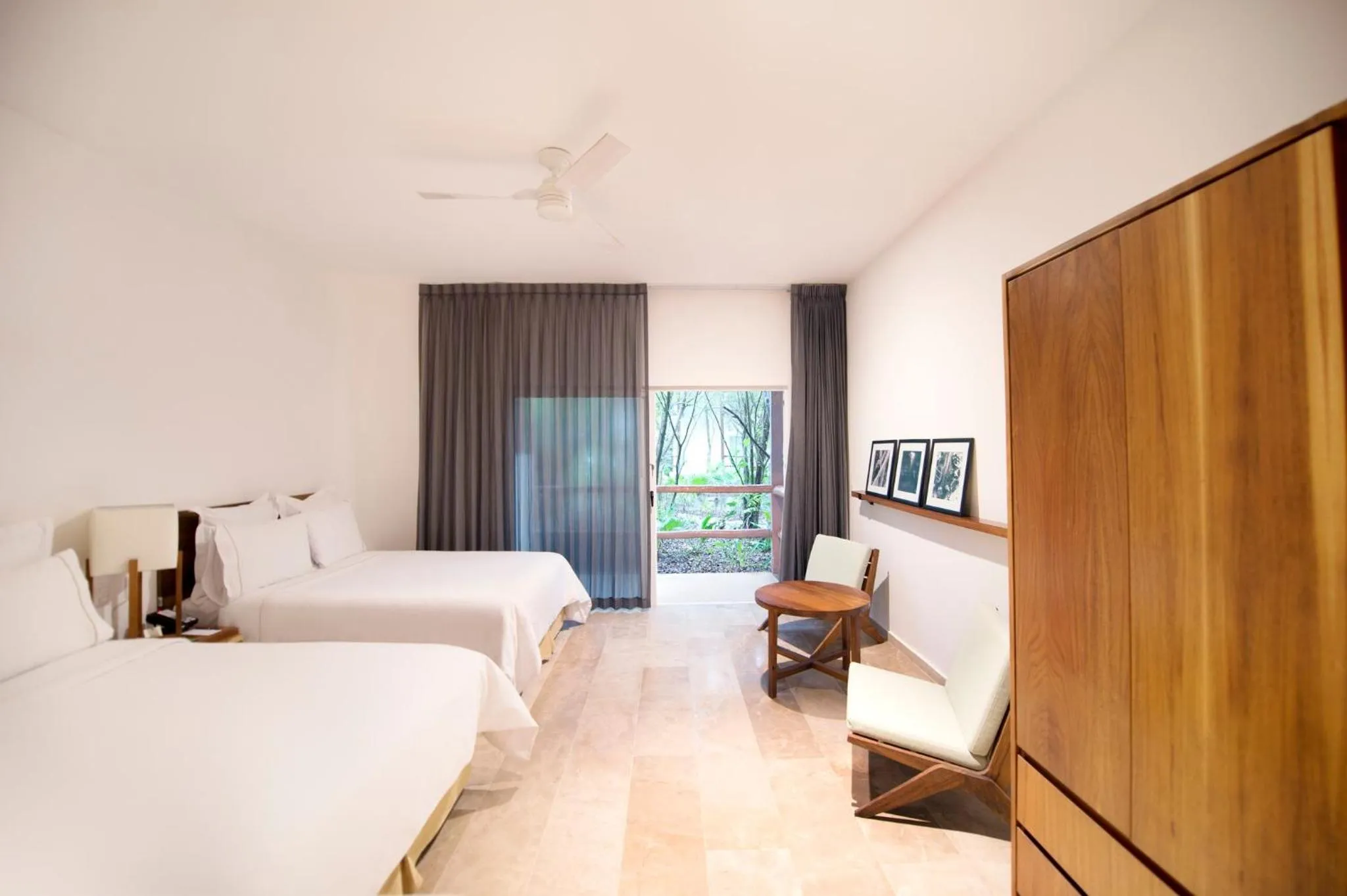 Photo of the whole room, Bed in The Explorean Cozumel All Inclusive