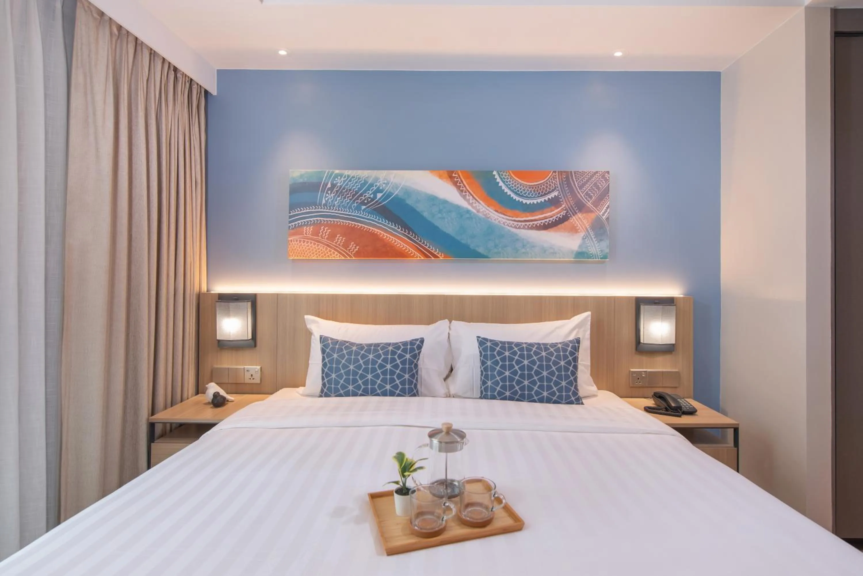 Bed in Citadines Roces Quezon City