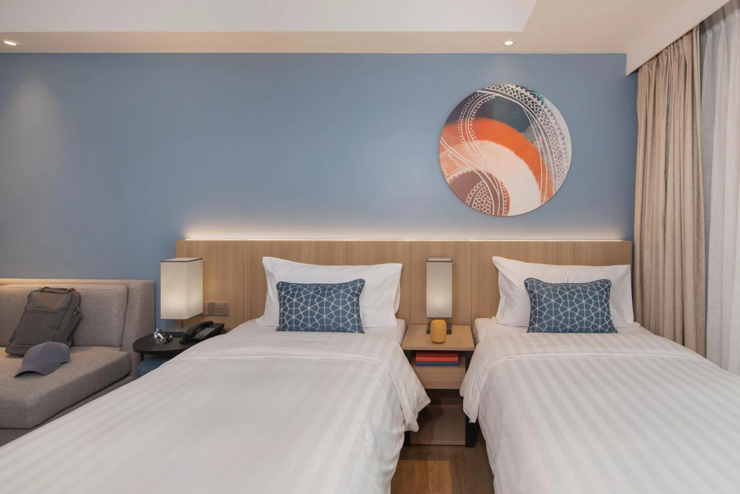 Bed in Citadines Roces Quezon City