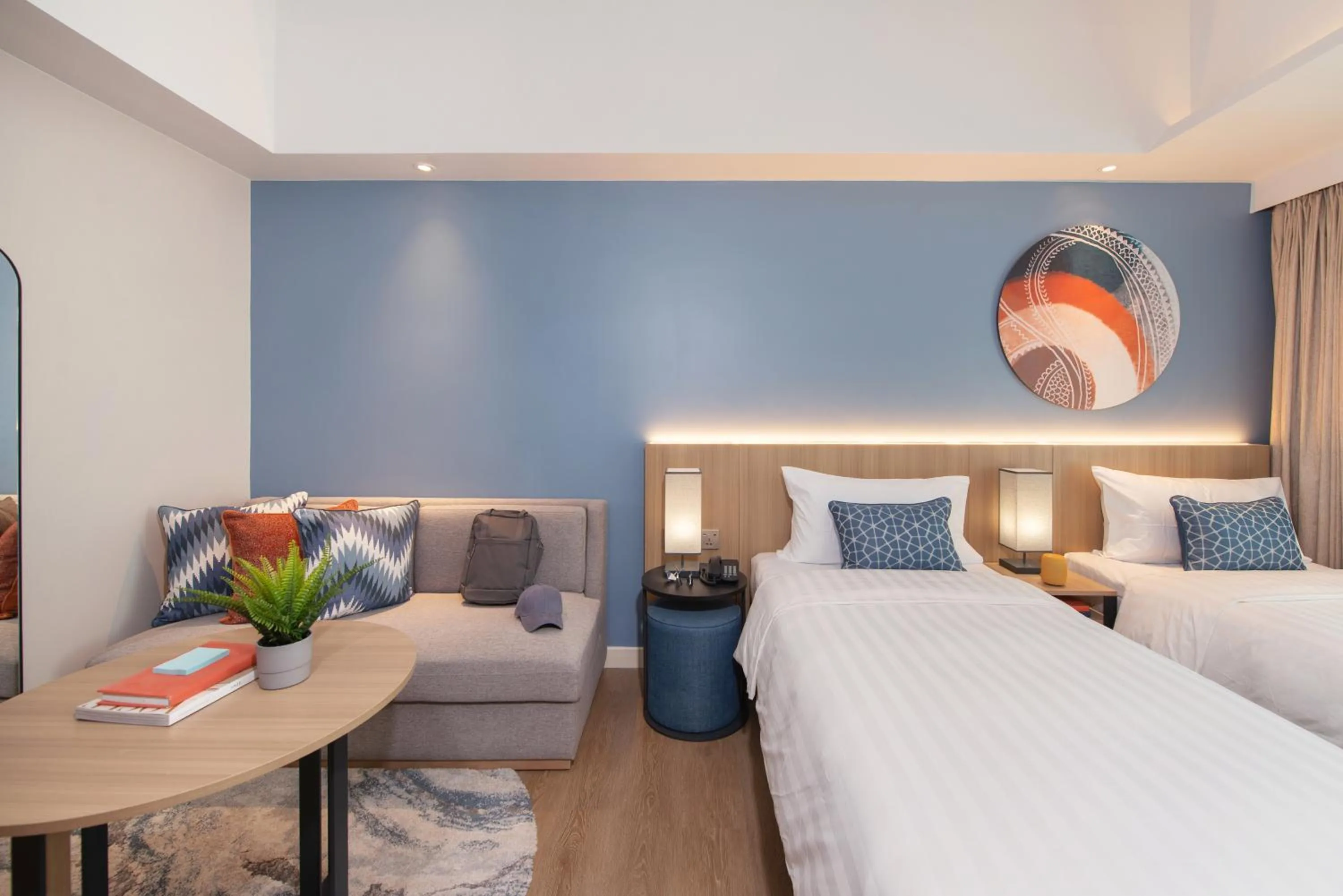 Seating area, Bed in Citadines Roces Quezon City