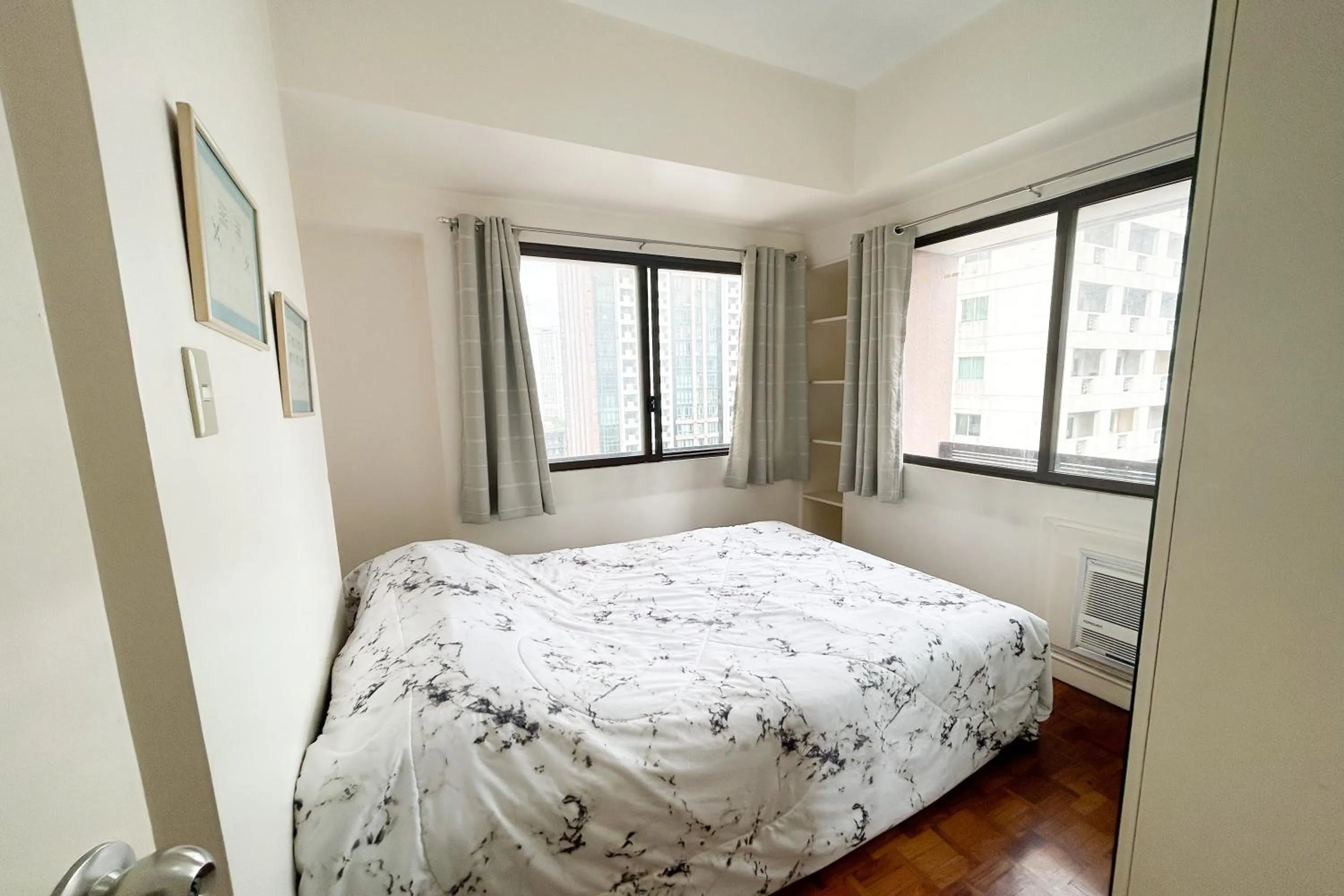 Bed in Sunette Tower Suites Makati