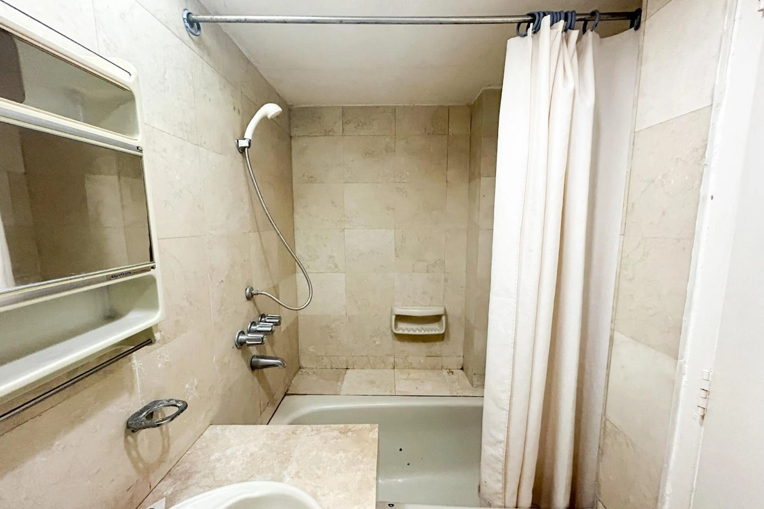 Shower in Sunette Tower Suites Makati