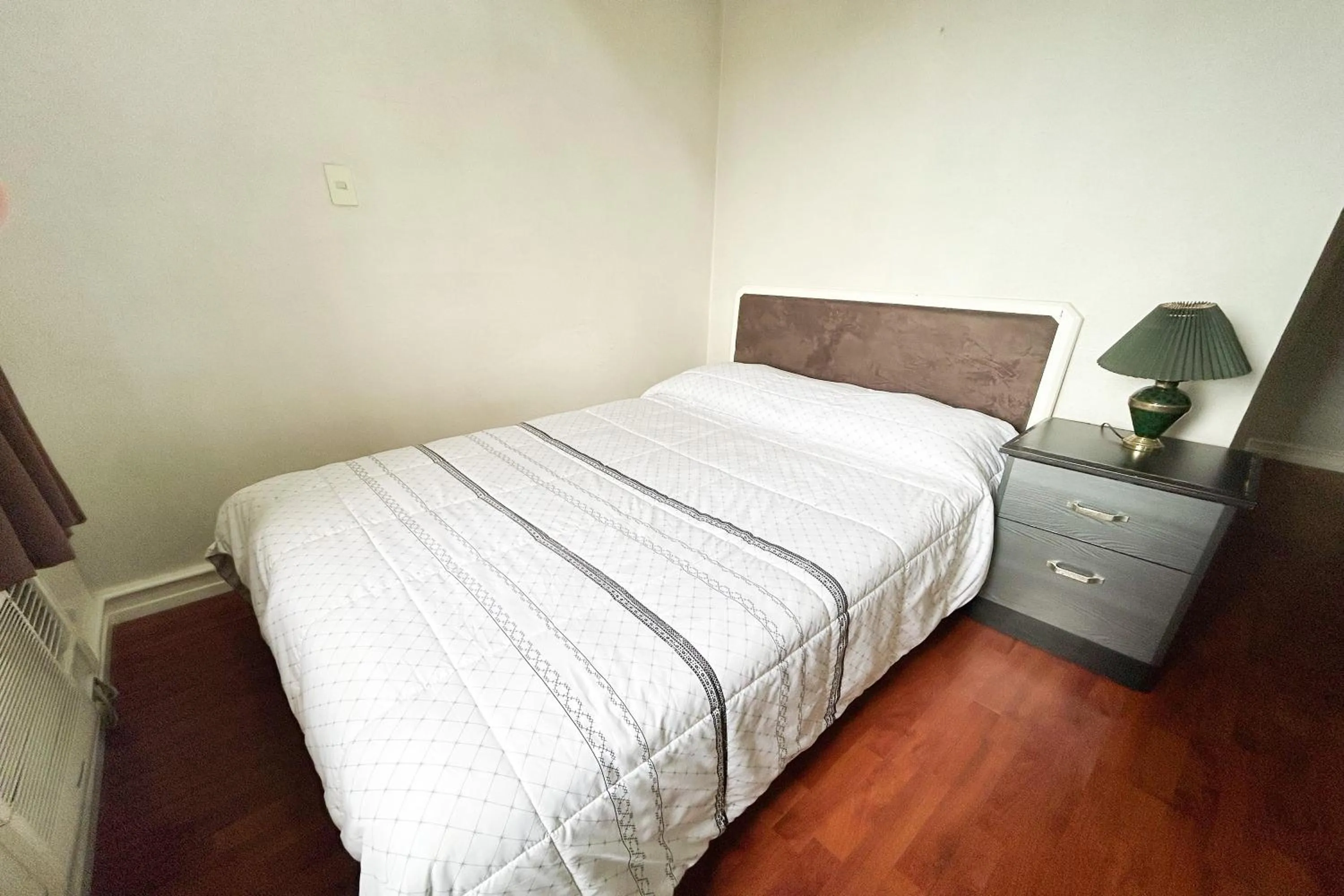 Bed in Sunette Tower Suites Makati