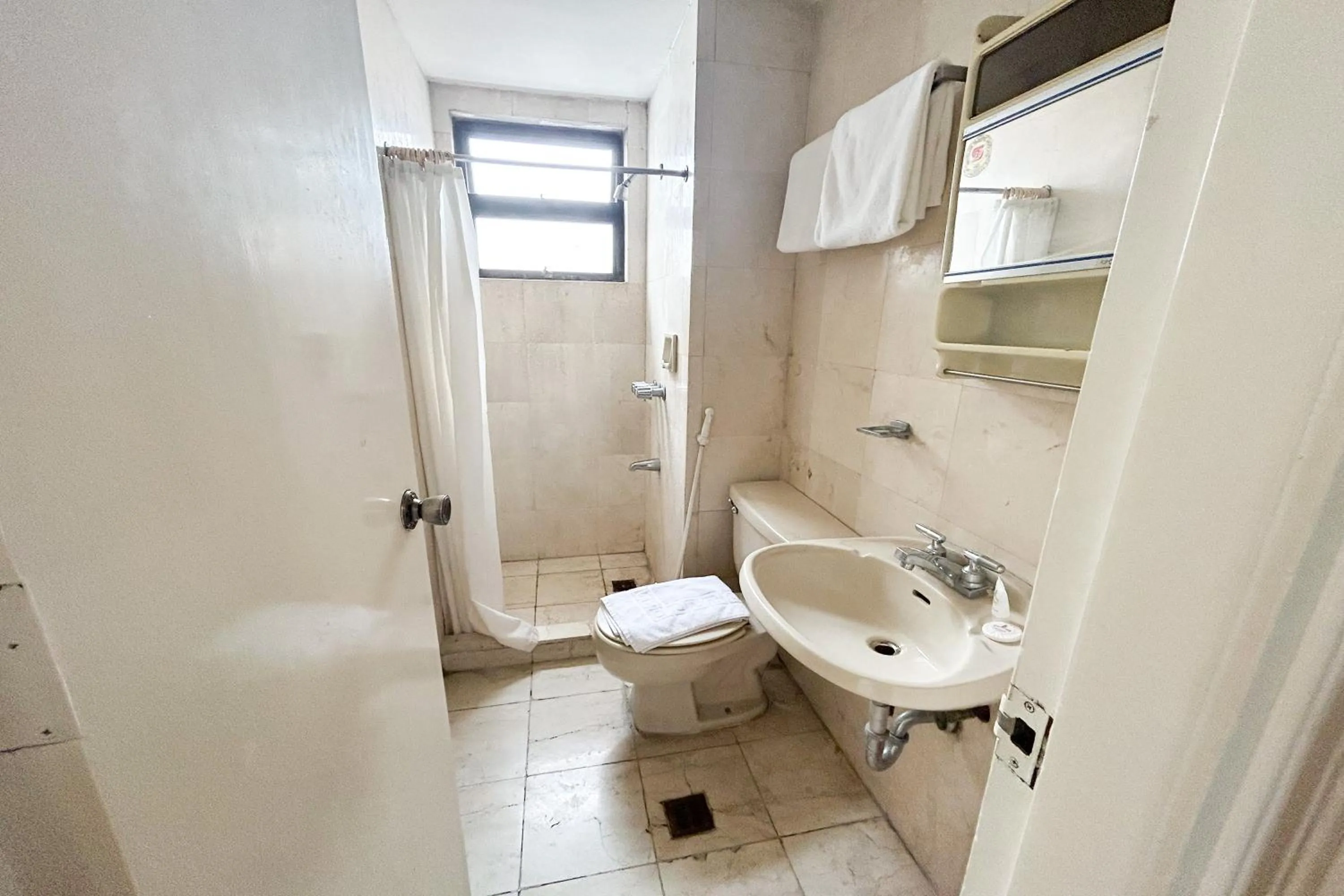 Bathroom in Sunette Tower Suites Makati