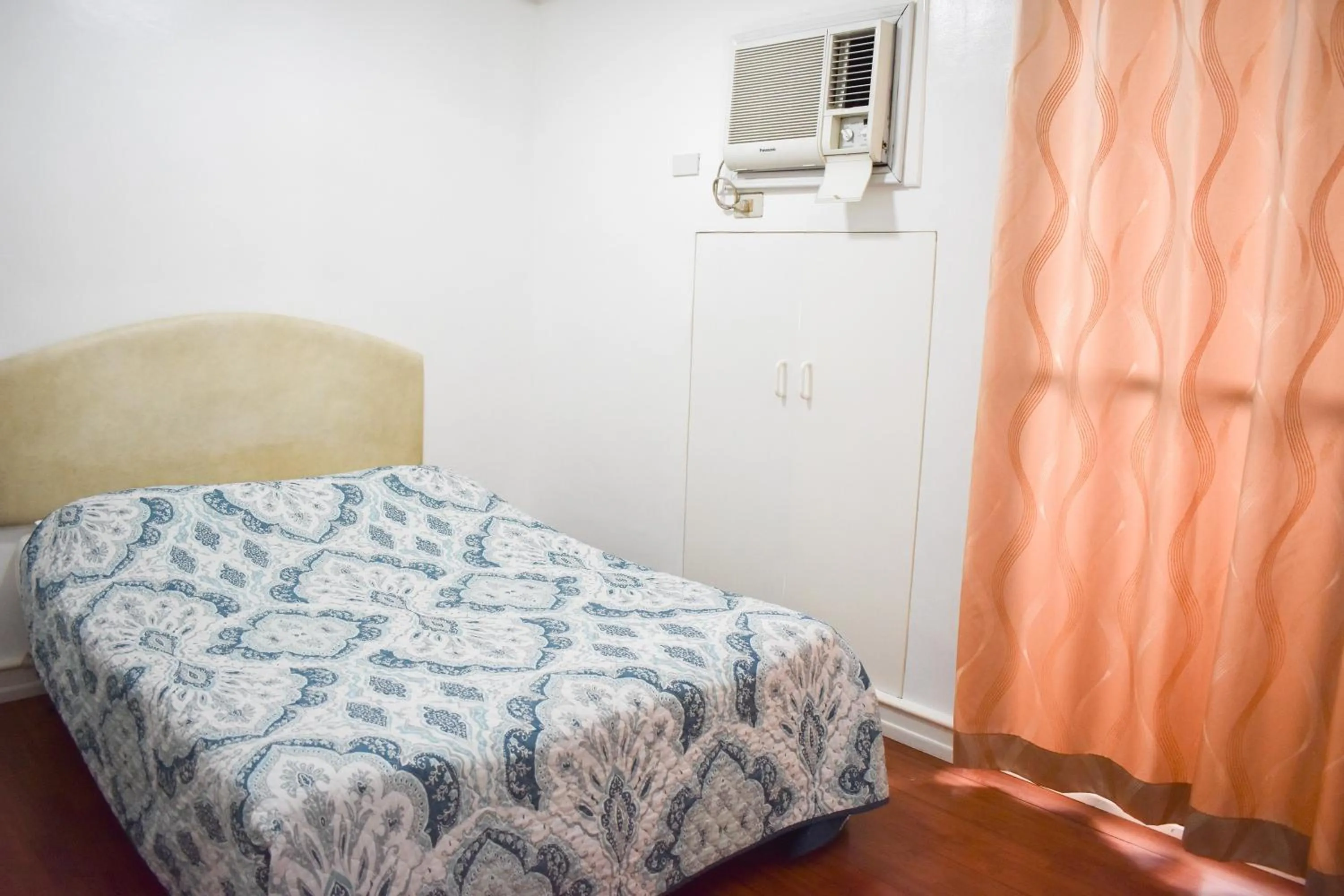 Bed in Sunette Tower Suites Makati