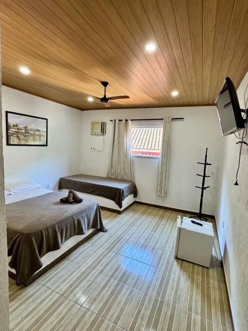 Bed in Pousada da Praia