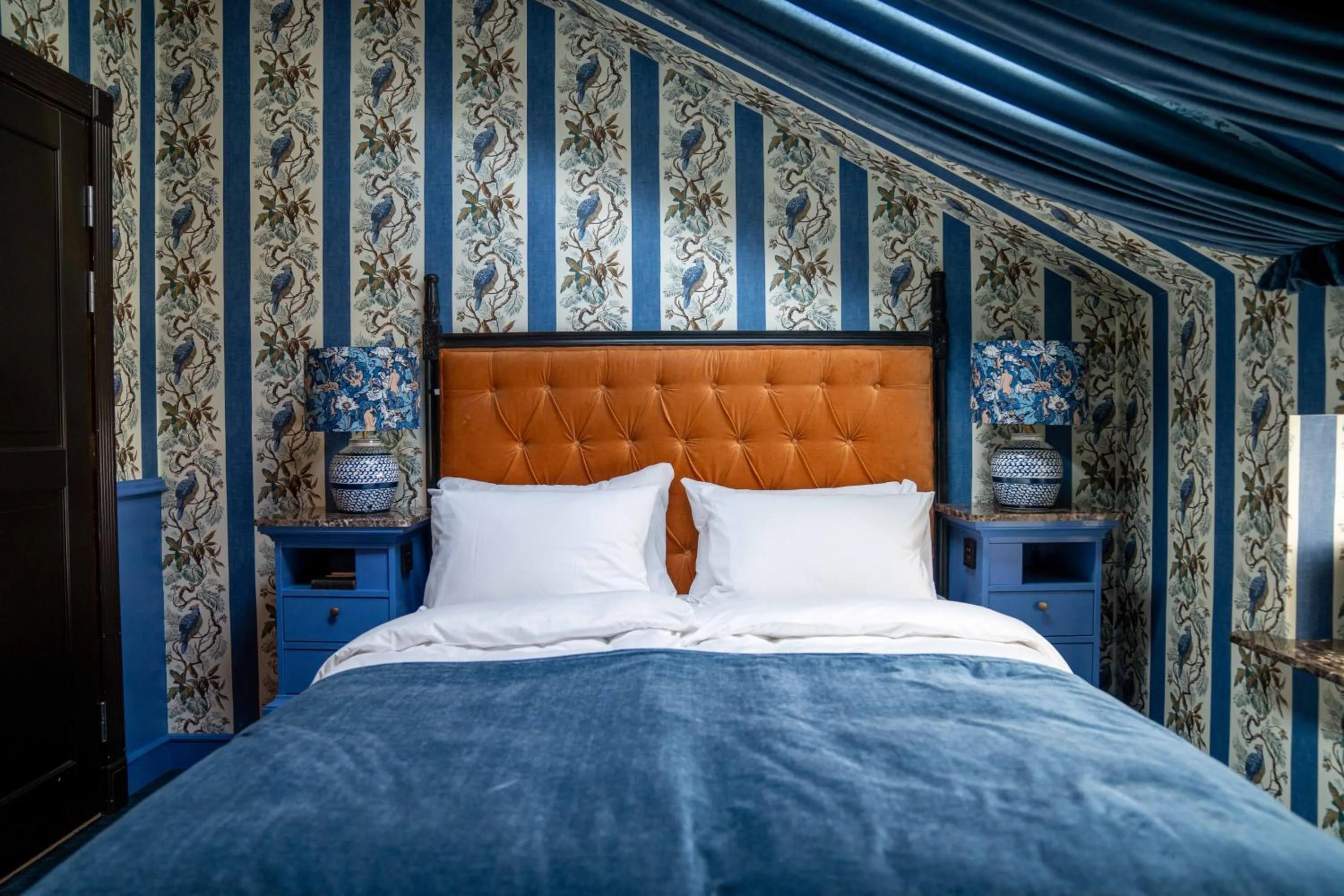 Bed in Charmante Skostredet Hôtel