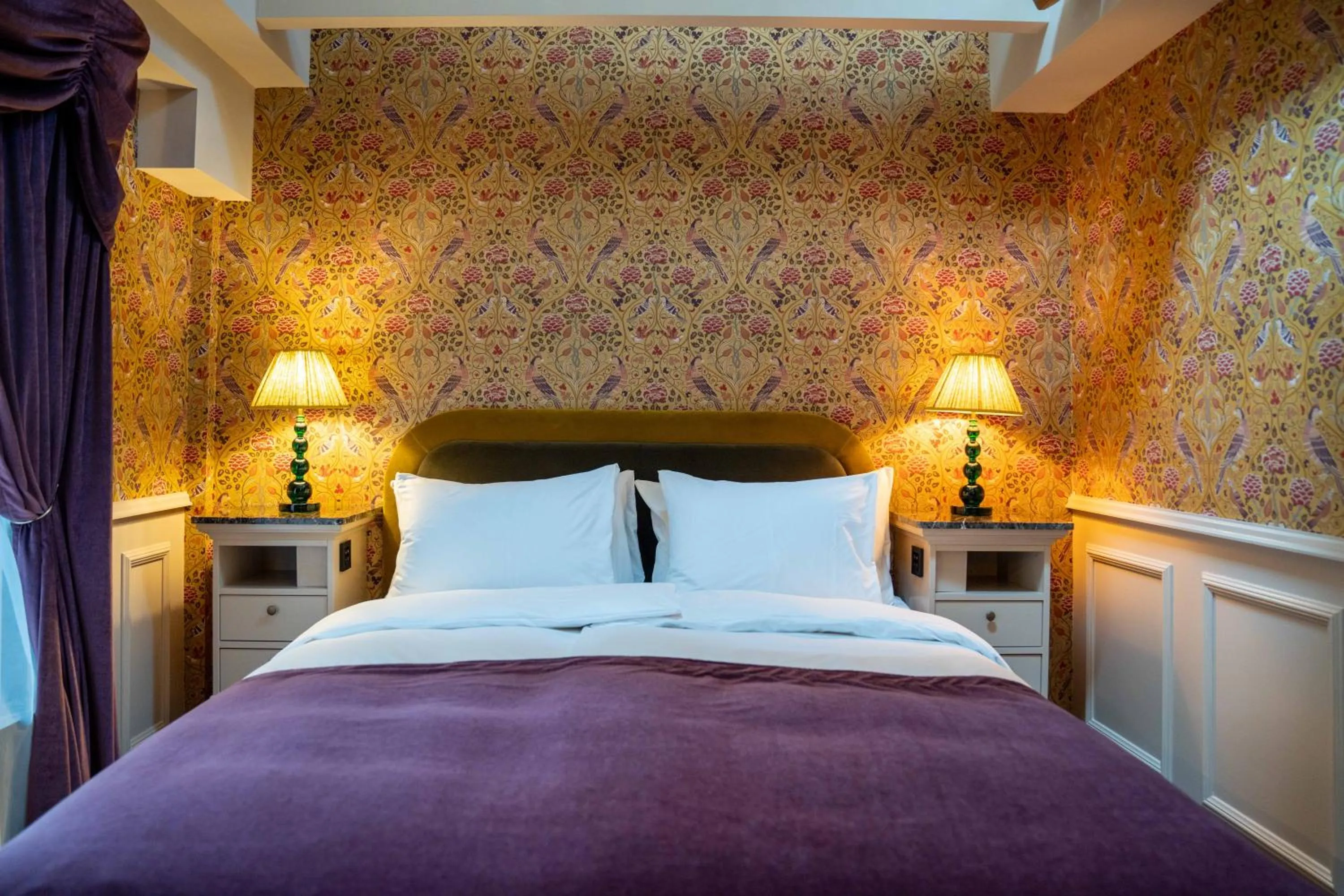 Bed in Charmante Skostredet Hôtel