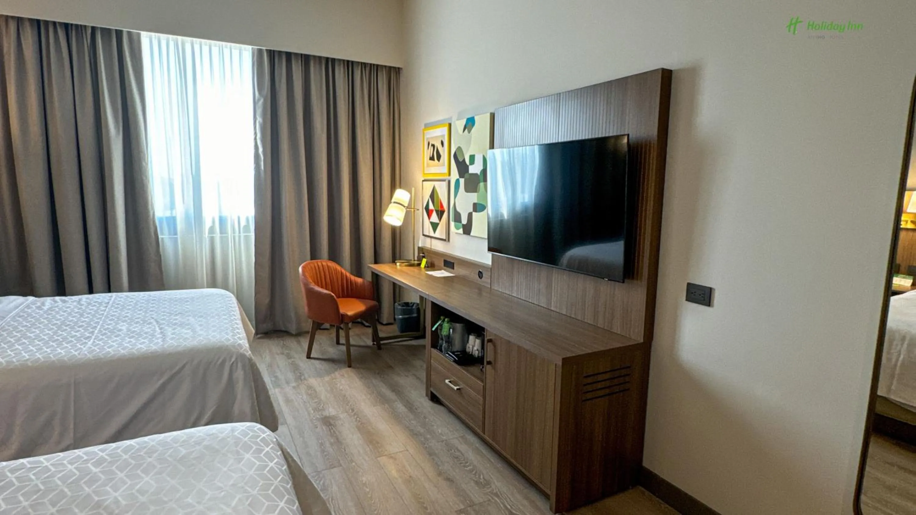 Communal lounge/ TV room, Bed in Holiday Inn Navojoa, an IHG Hotel
