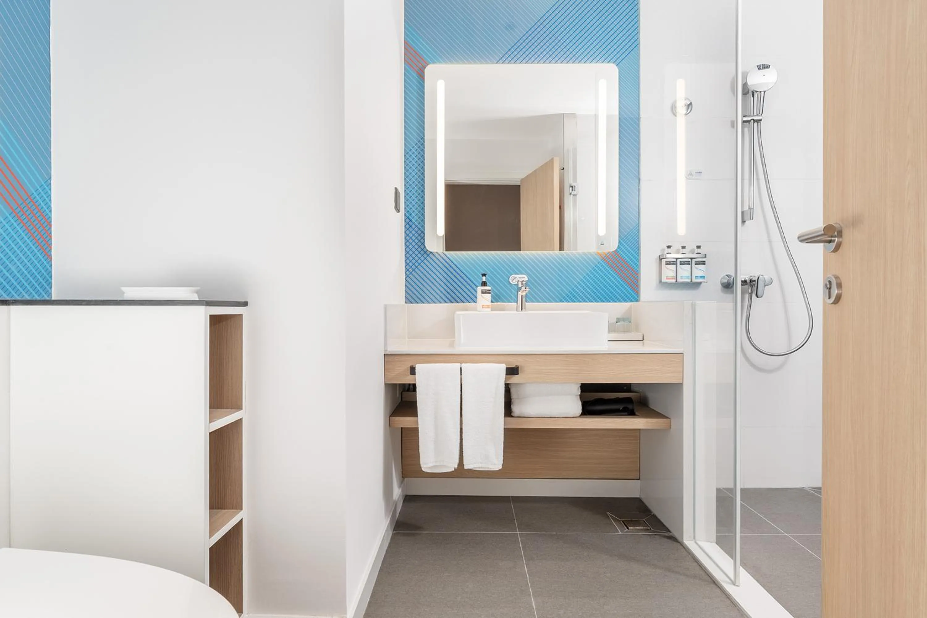 Bathroom in Holiday Inn Express Dandong City Center by IHG