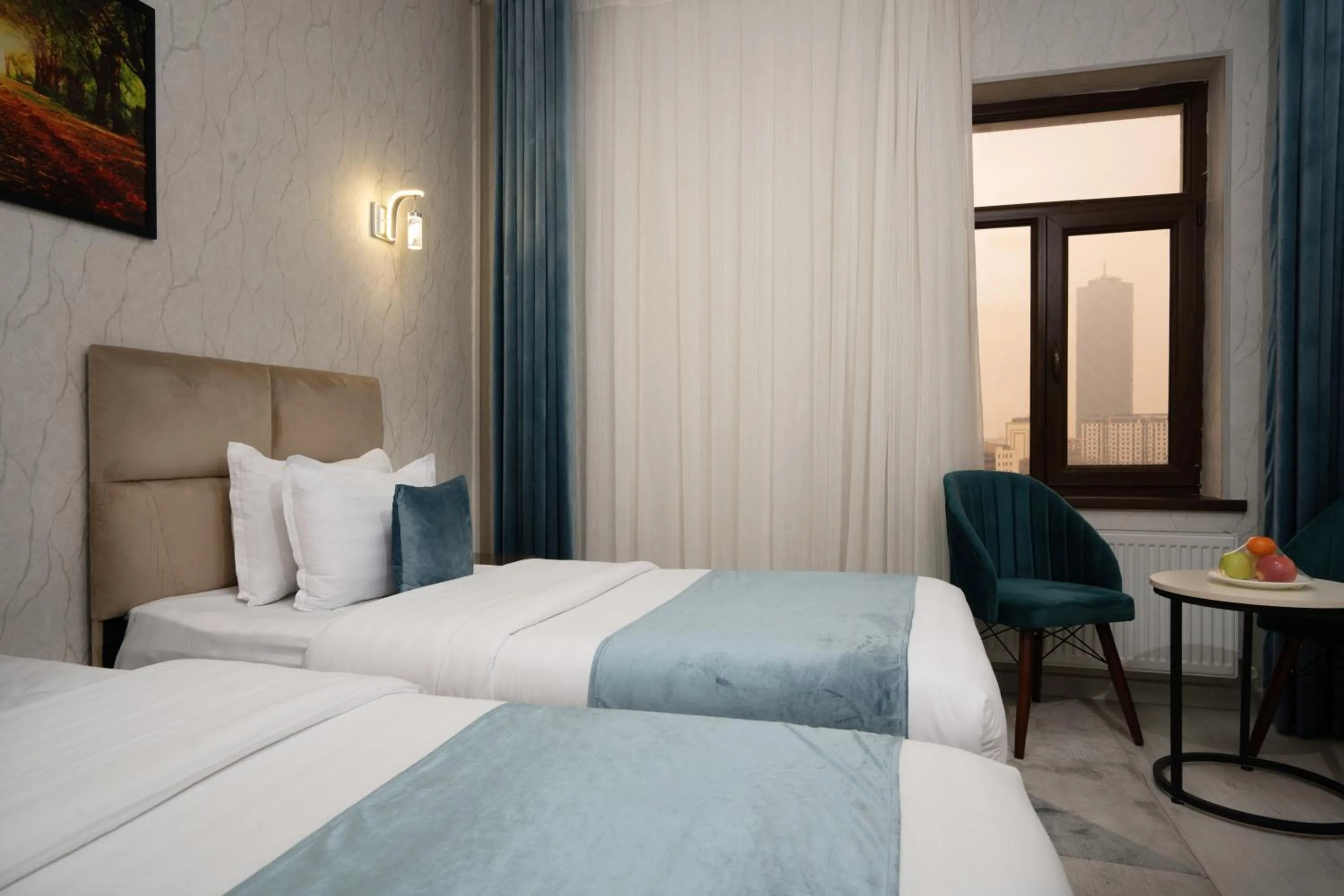 Bed in The Tower Hotel Tashkent by HotelPro Group