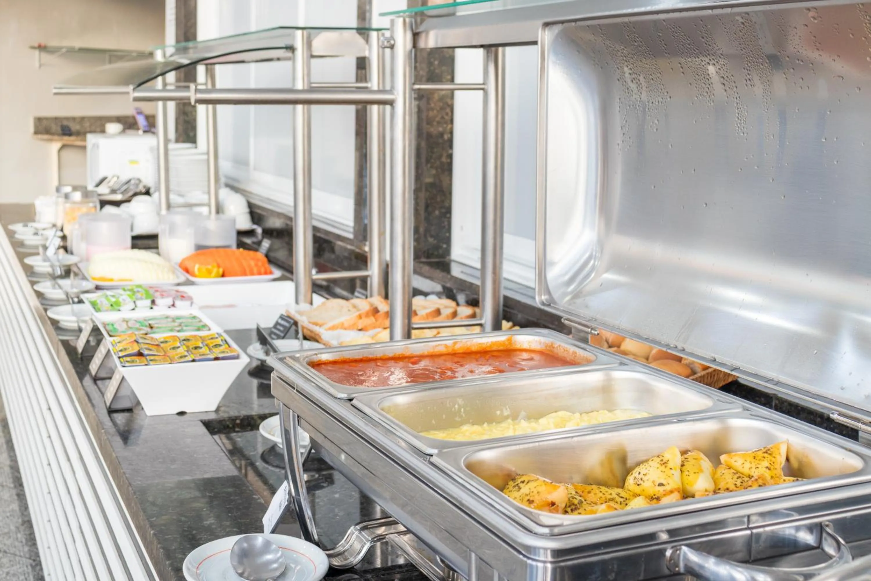 Kitchen or kitchenette in Foz Budget Hotel