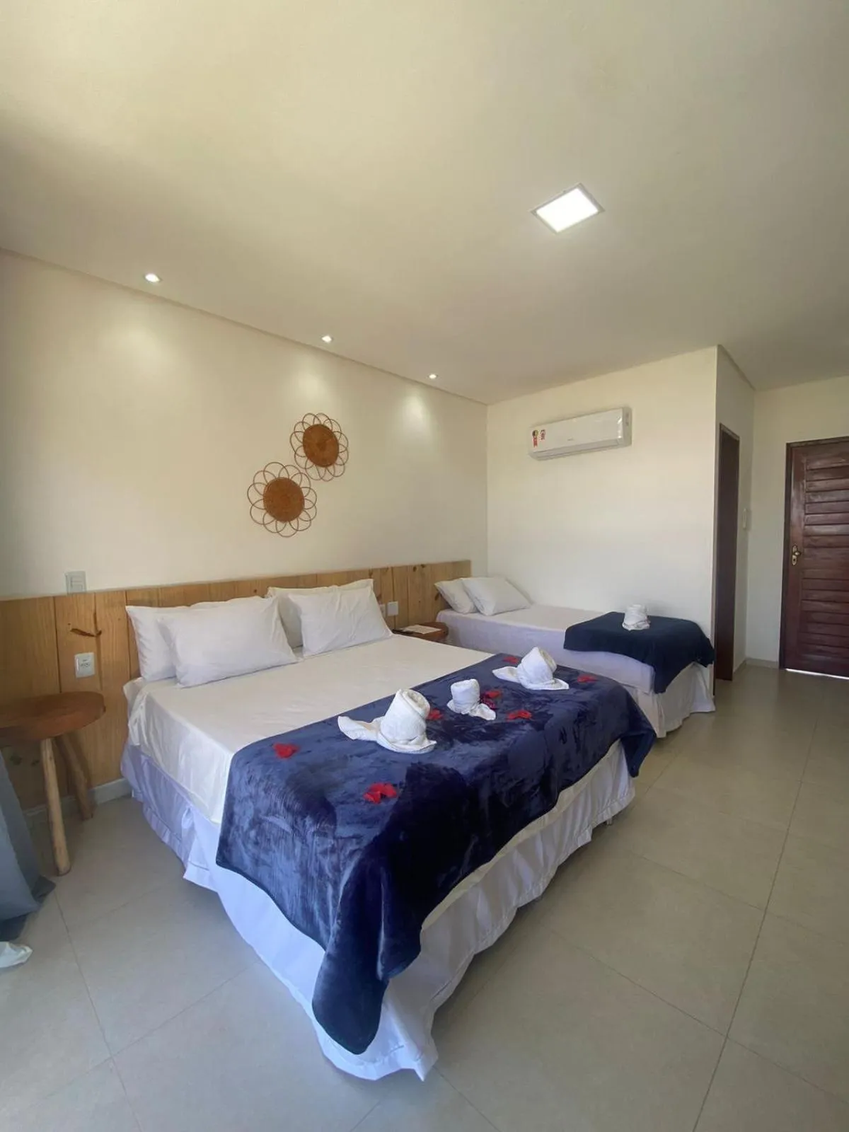 Bed in Pousada Canouan