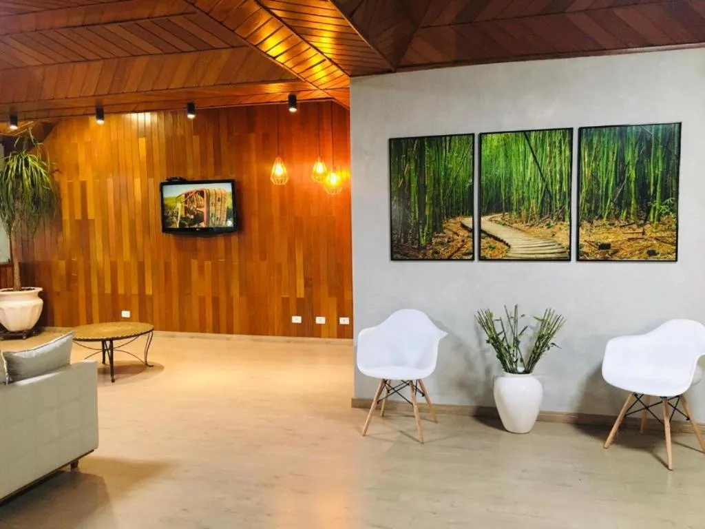 Communal lounge/ TV room in Harbor Self Cidade Verde