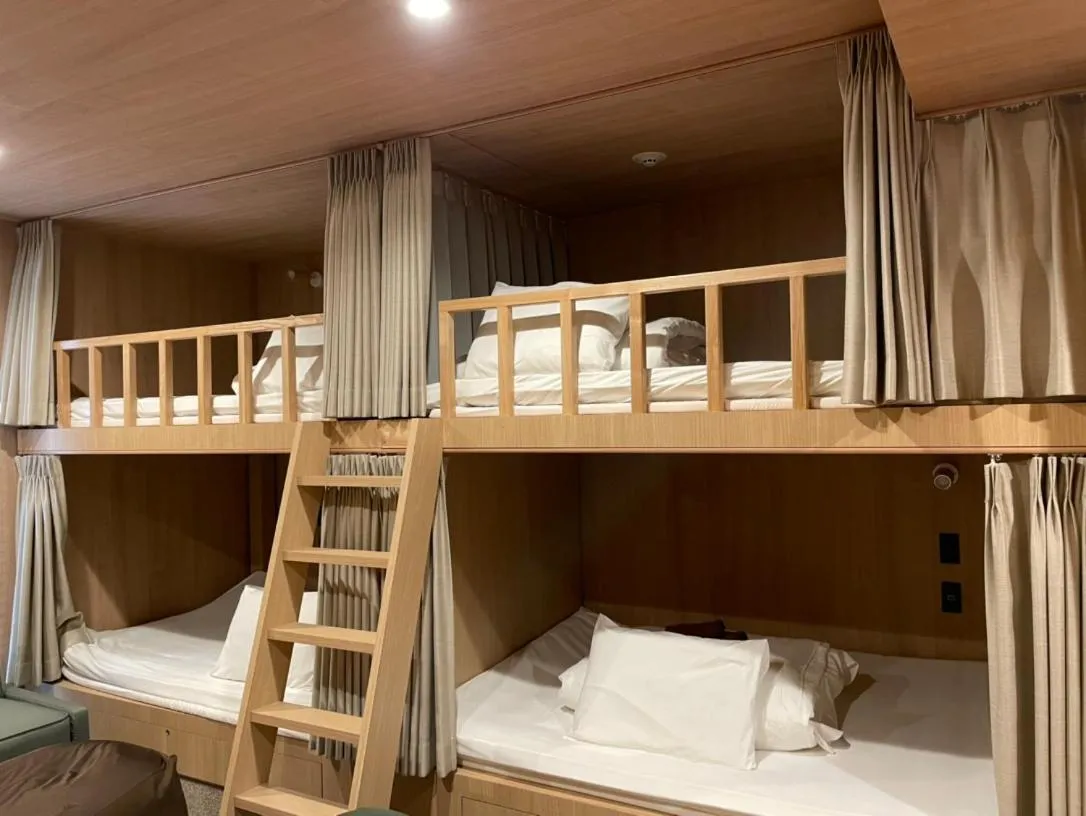 Bed in THE BONDS HOTEL TOKYO