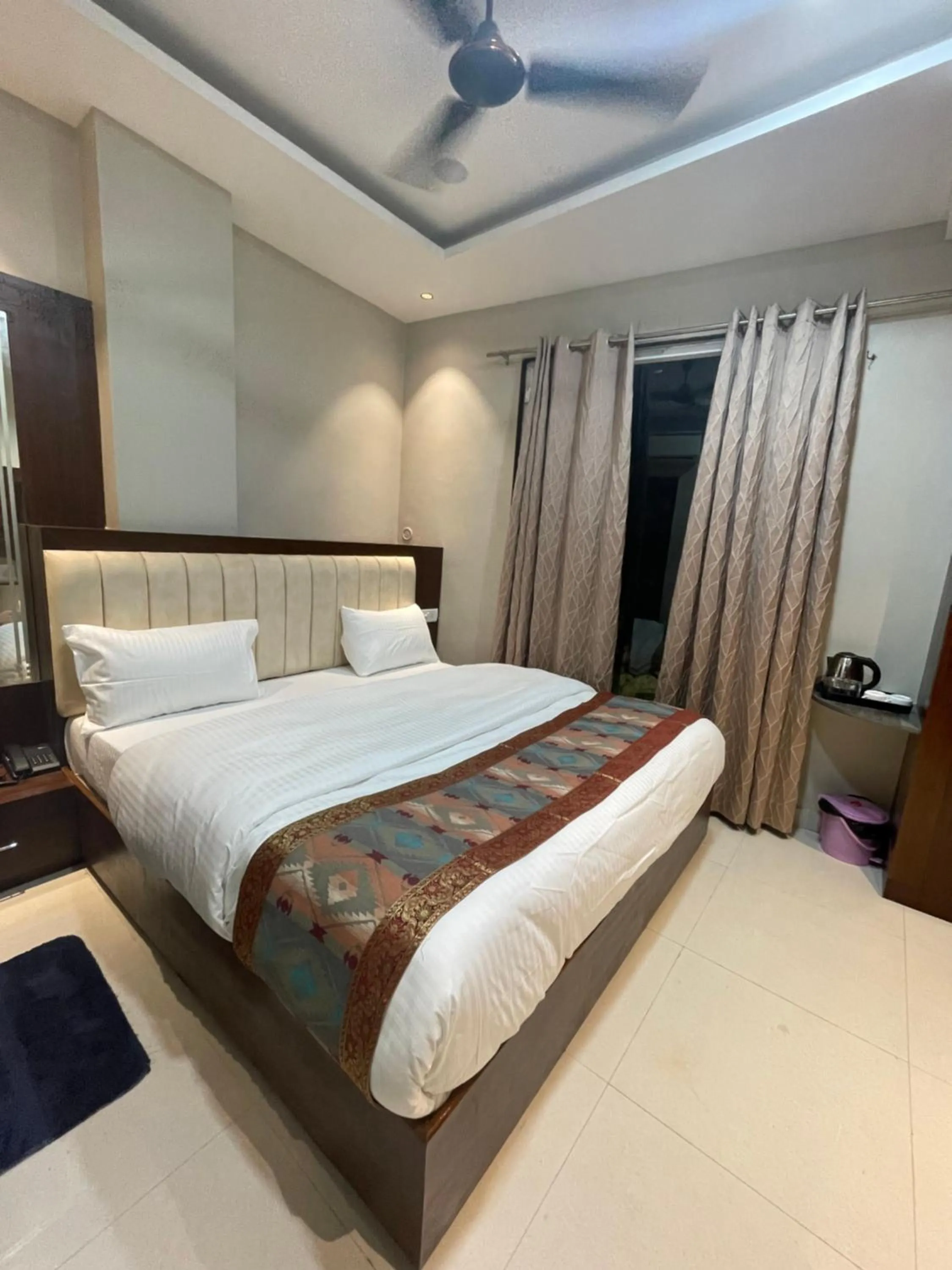 Bed in Vishwanath Inn