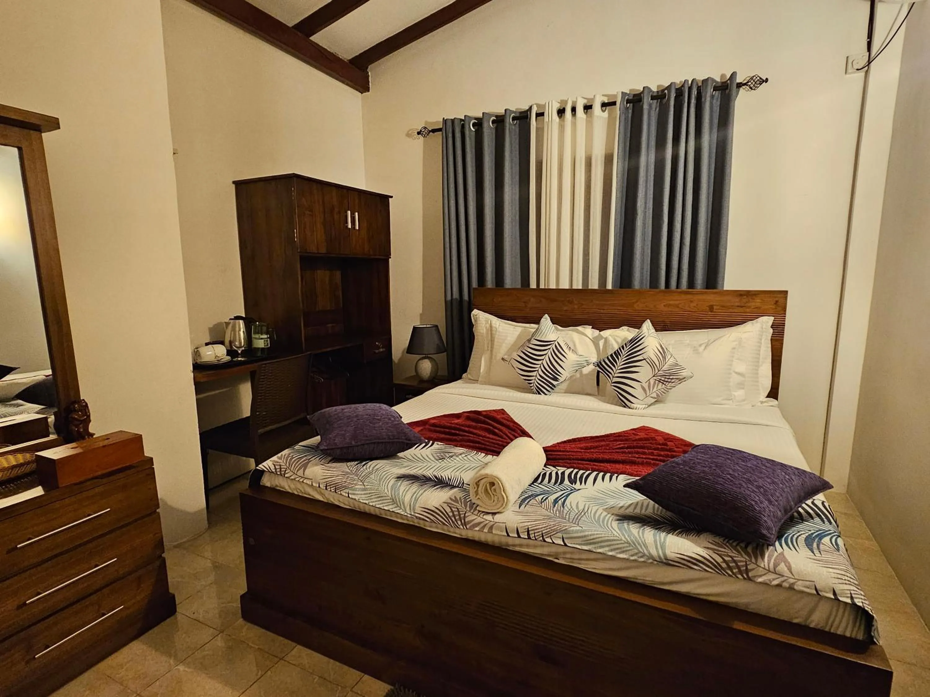 Bed in Ellakanda Nature Villa