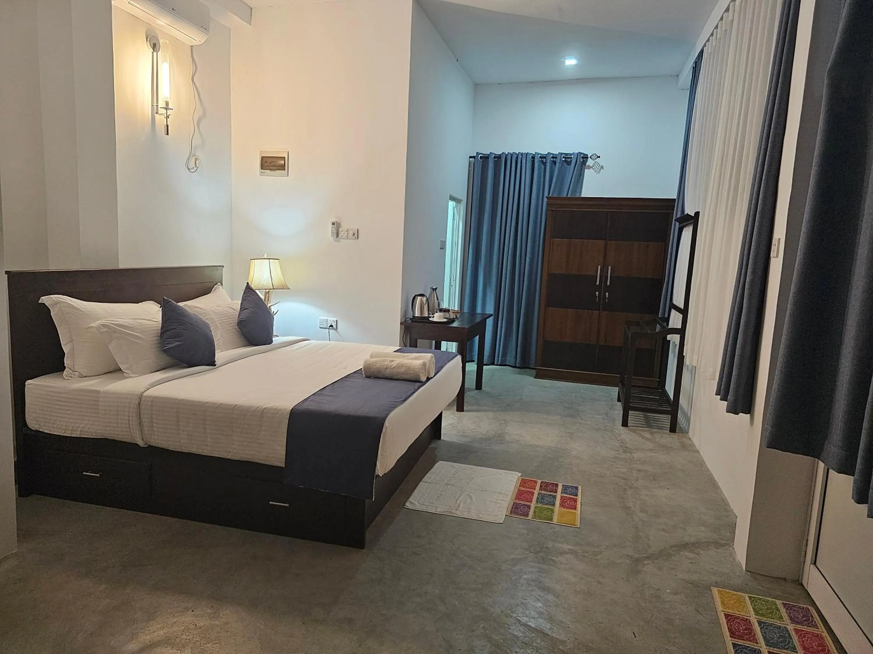 Bed in Ellakanda Nature Villa