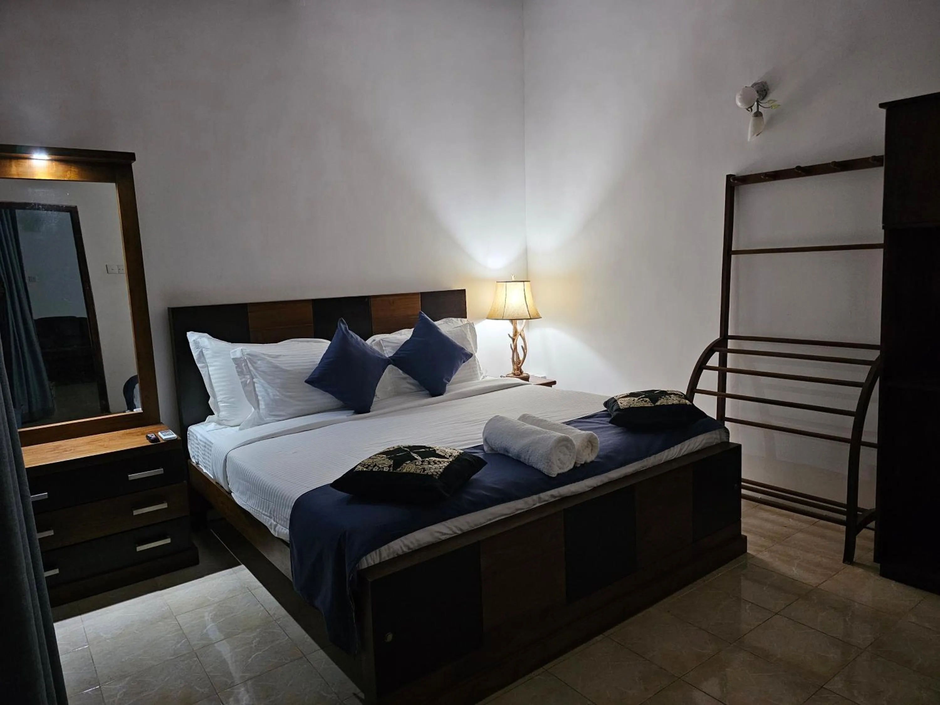 Bed in Ellakanda Nature Villa