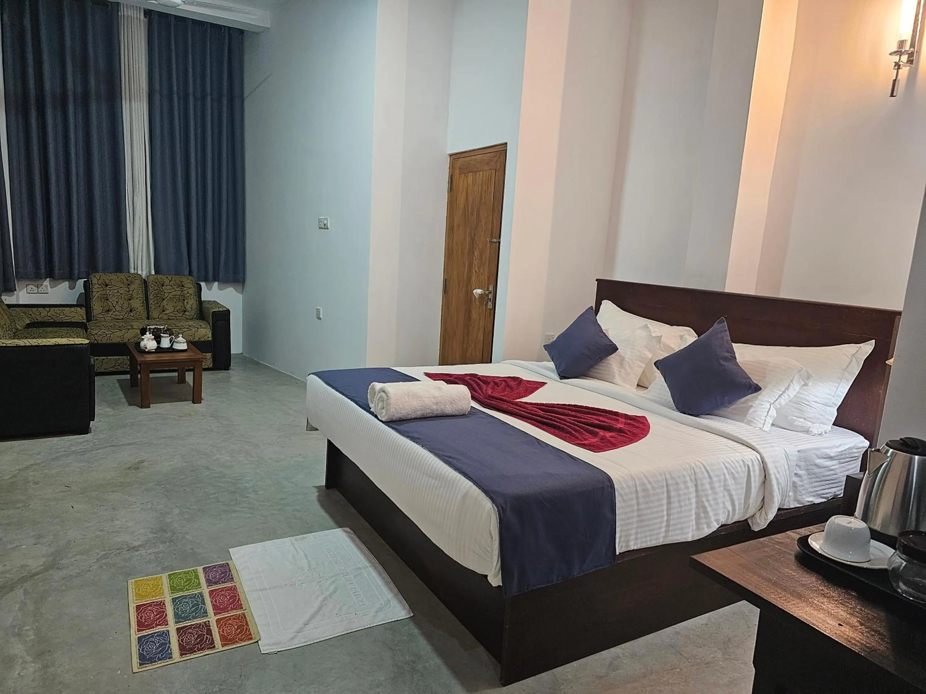 Bed in Ellakanda Nature Villa