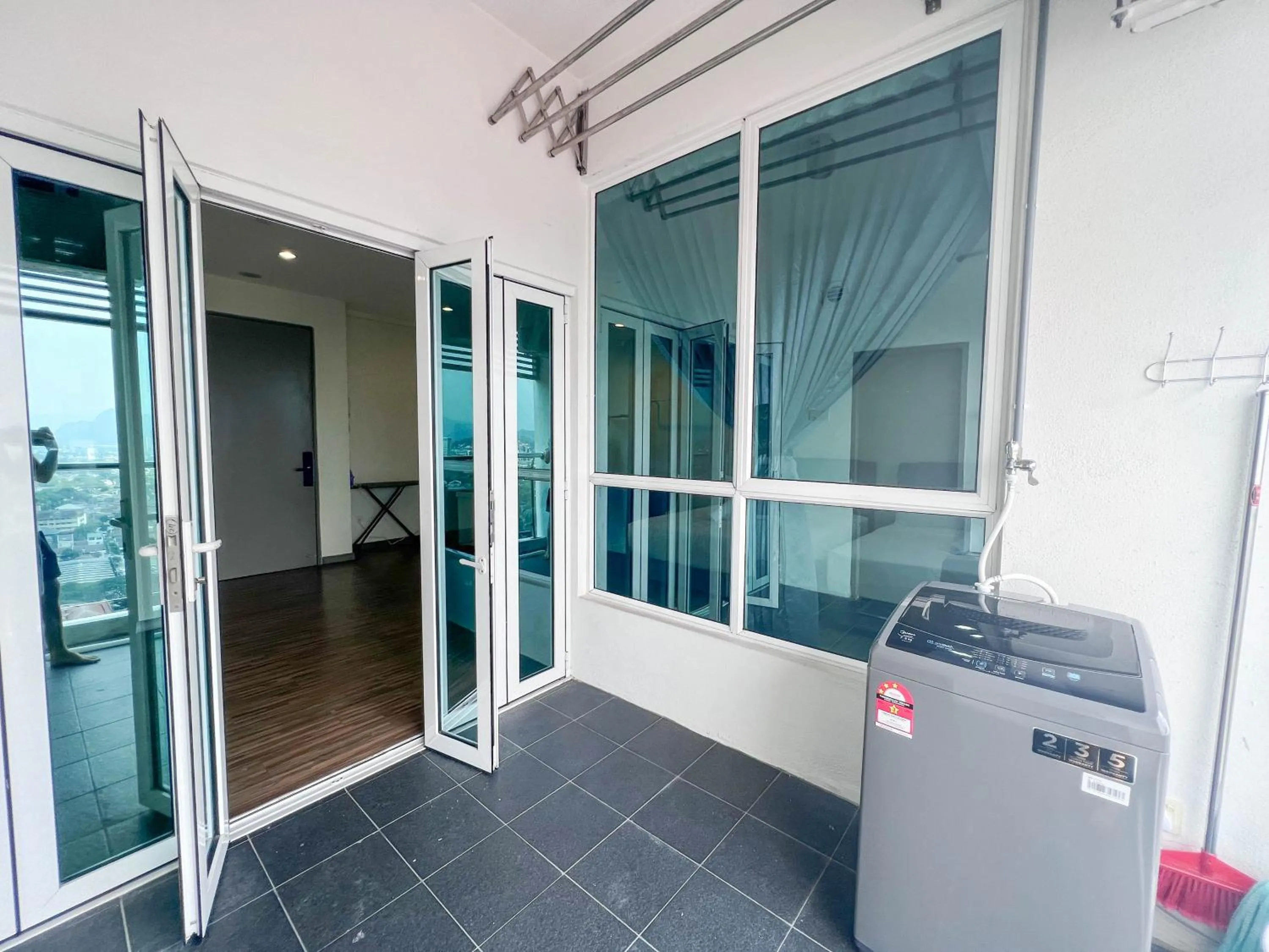 washing machine in Setapak Central Studio Suites by Manhattan Group