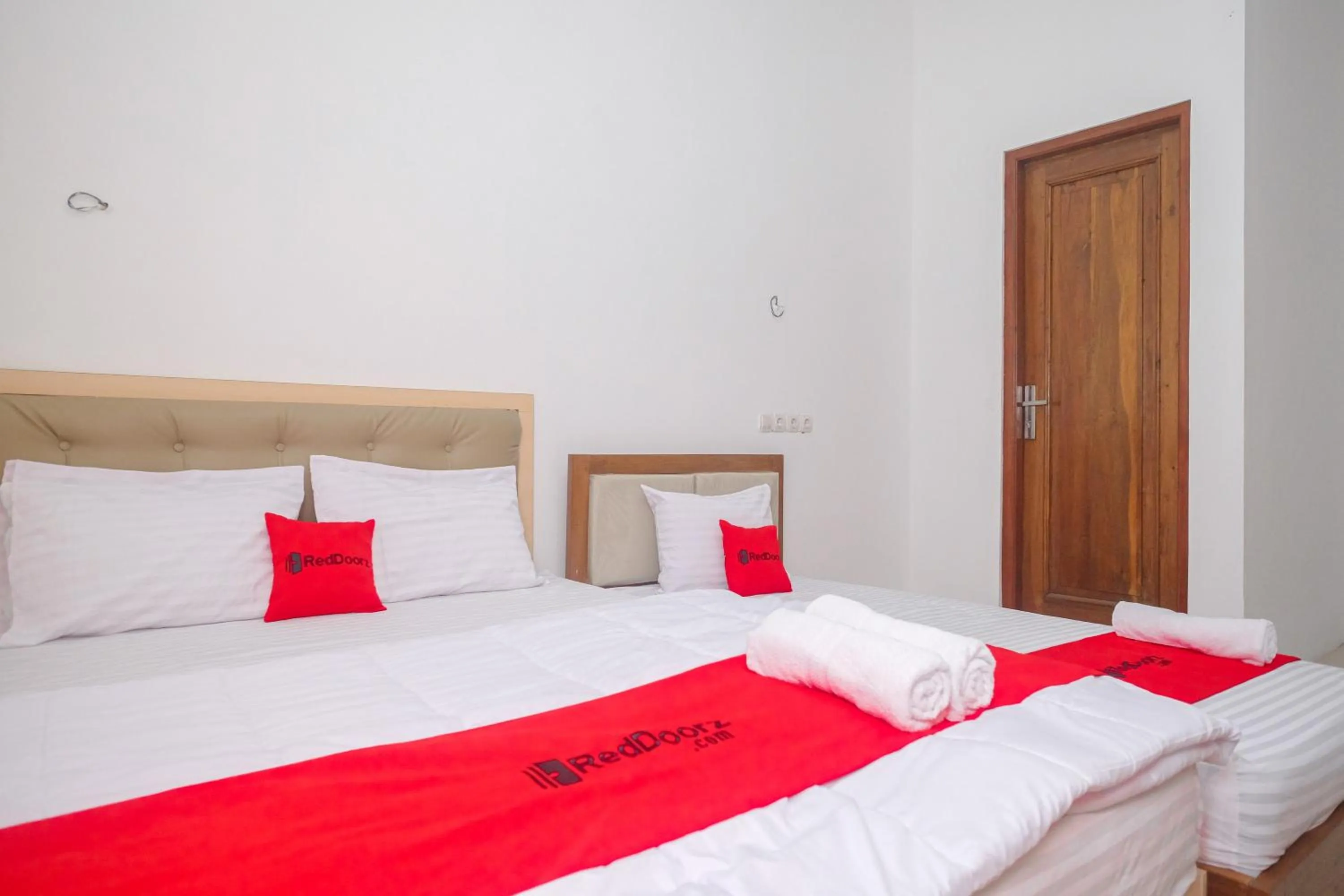 Bed in RedDoorz Syariah near Alun Alun Temanggung