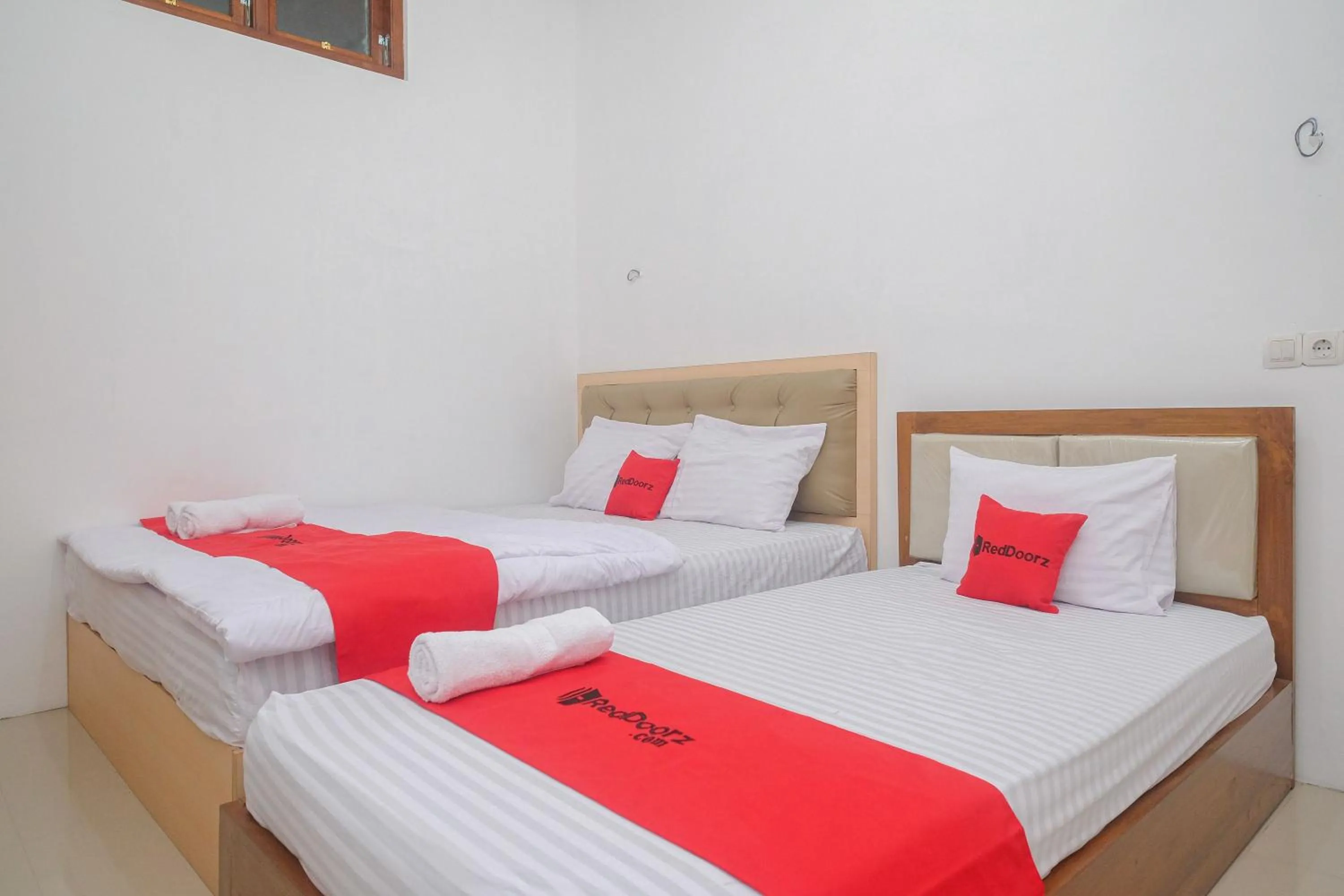 Bed in RedDoorz Syariah near Alun Alun Temanggung