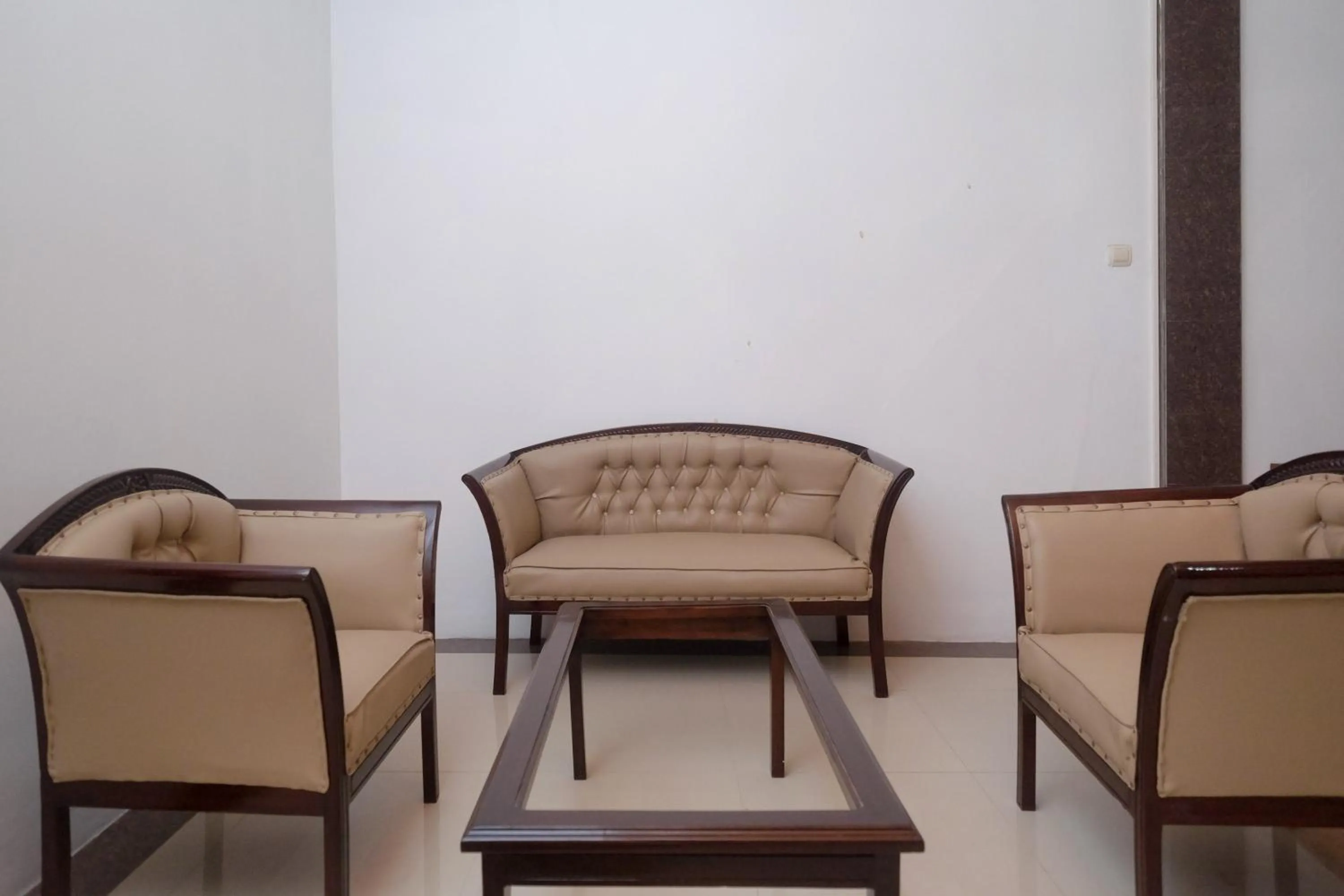 Seating area in RedDoorz Syariah near Alun Alun Temanggung