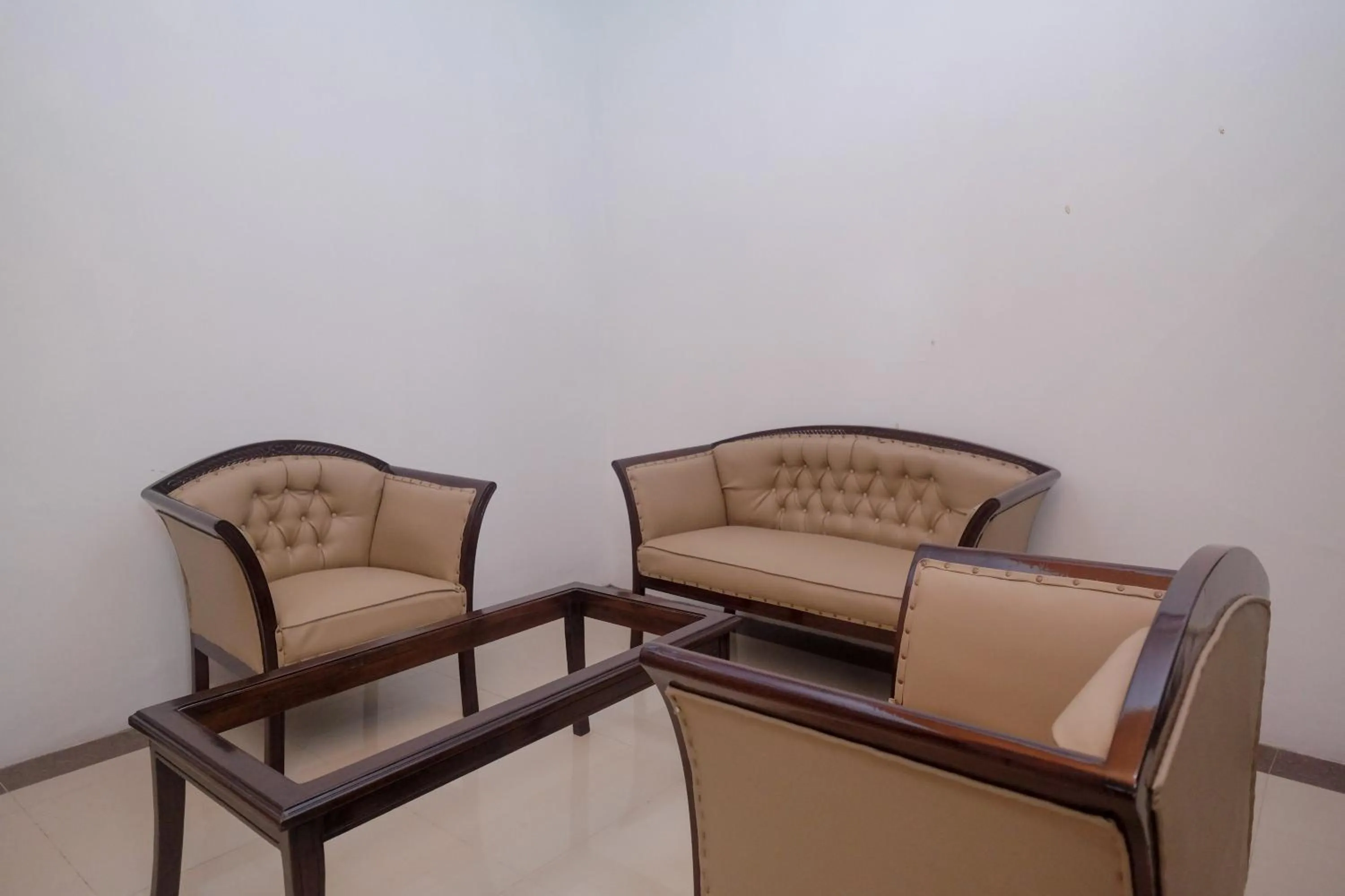 Seating area in RedDoorz Syariah near Alun Alun Temanggung