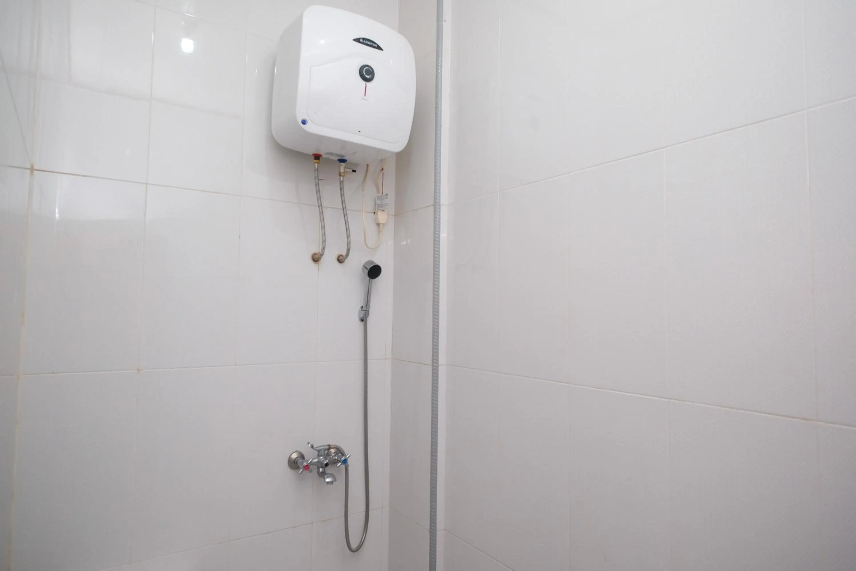 Bathroom in RedDoorz Syariah near Alun Alun Temanggung