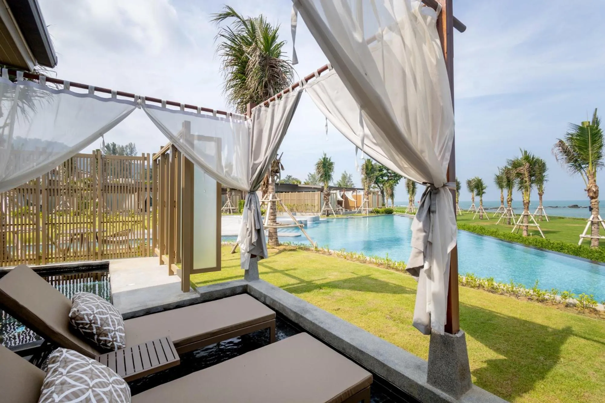 Pool view in The Little Shore Khao Lak by Katathani