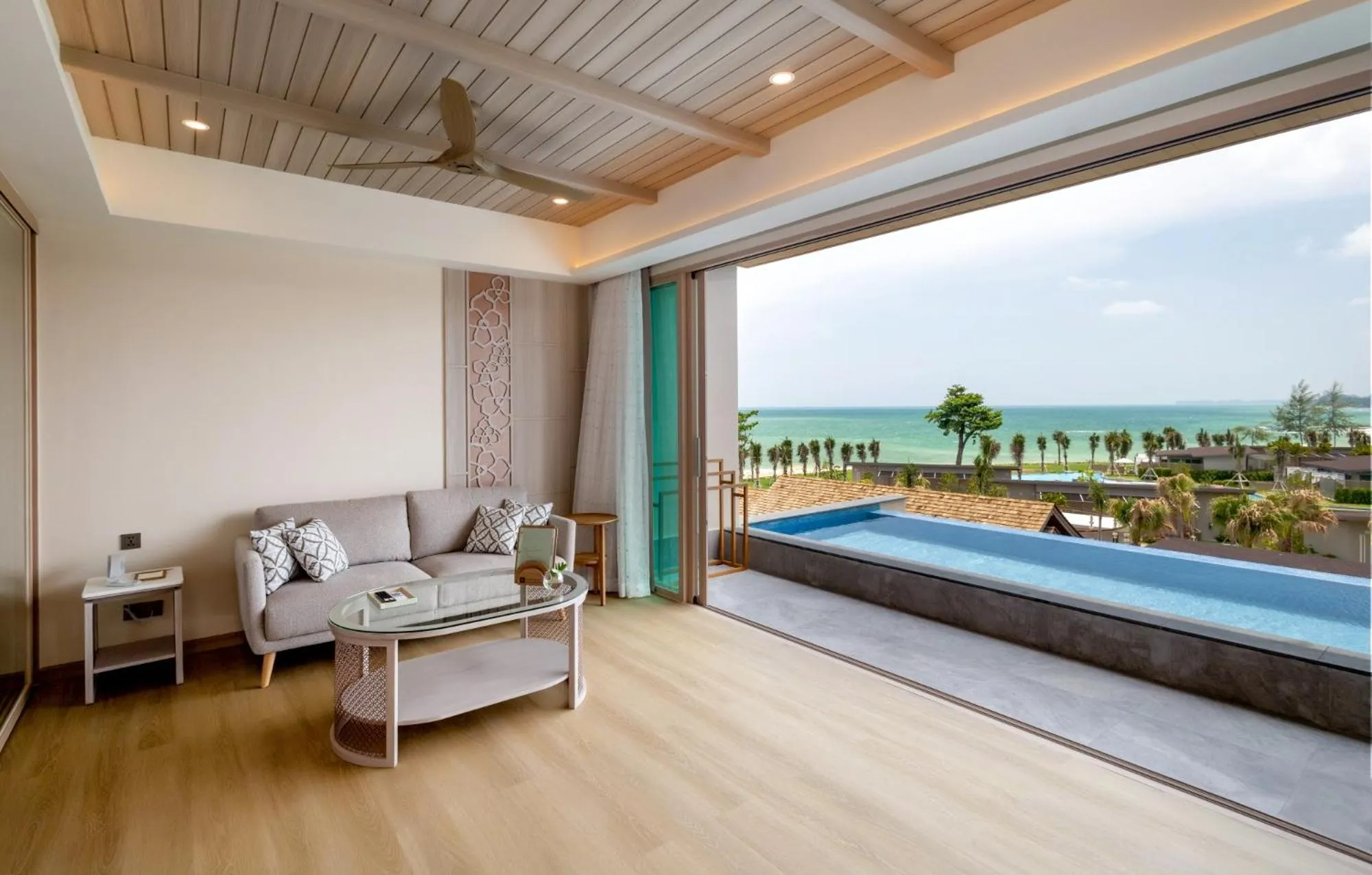 Living room in The Little Shore Khao Lak by Katathani