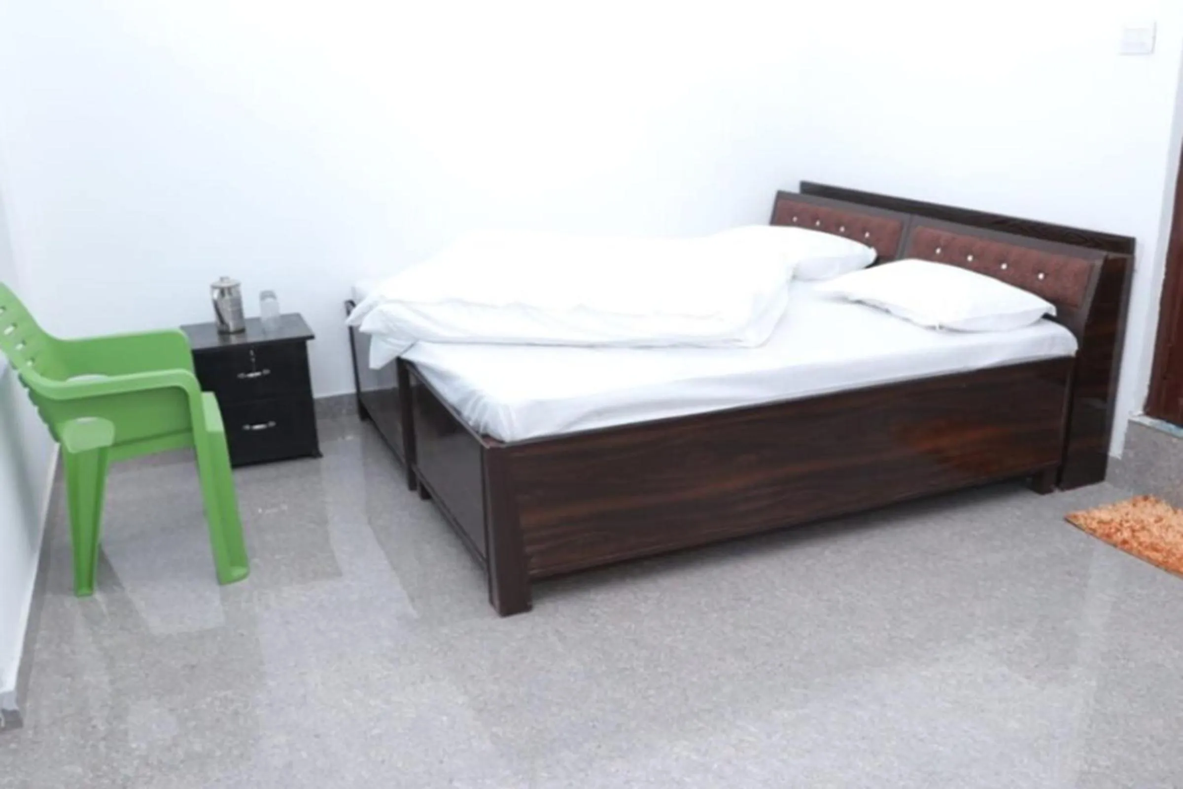 Bedroom, Bed in Hotel Prakash by StayApart