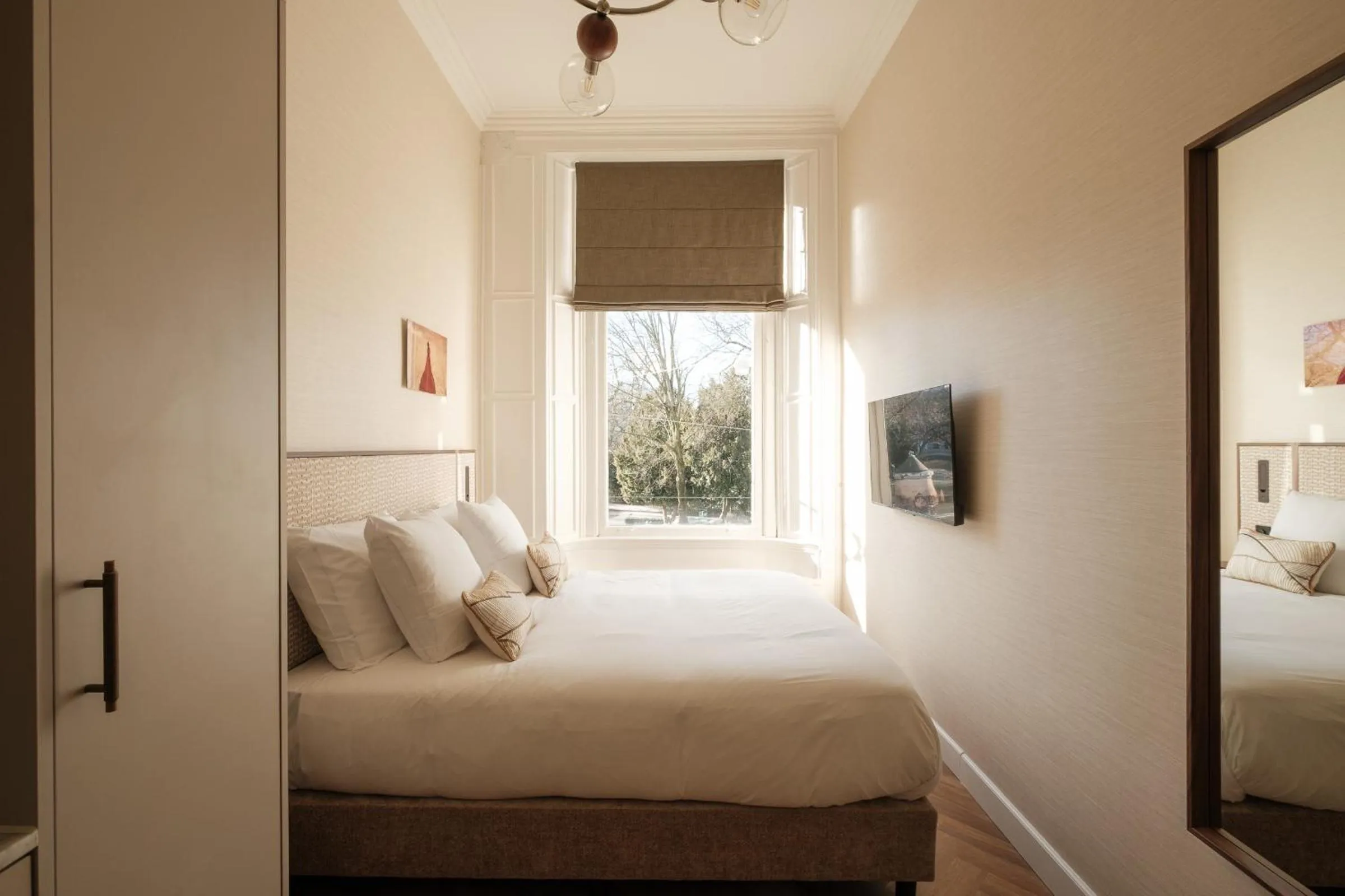 Bed in Parklane Hotel