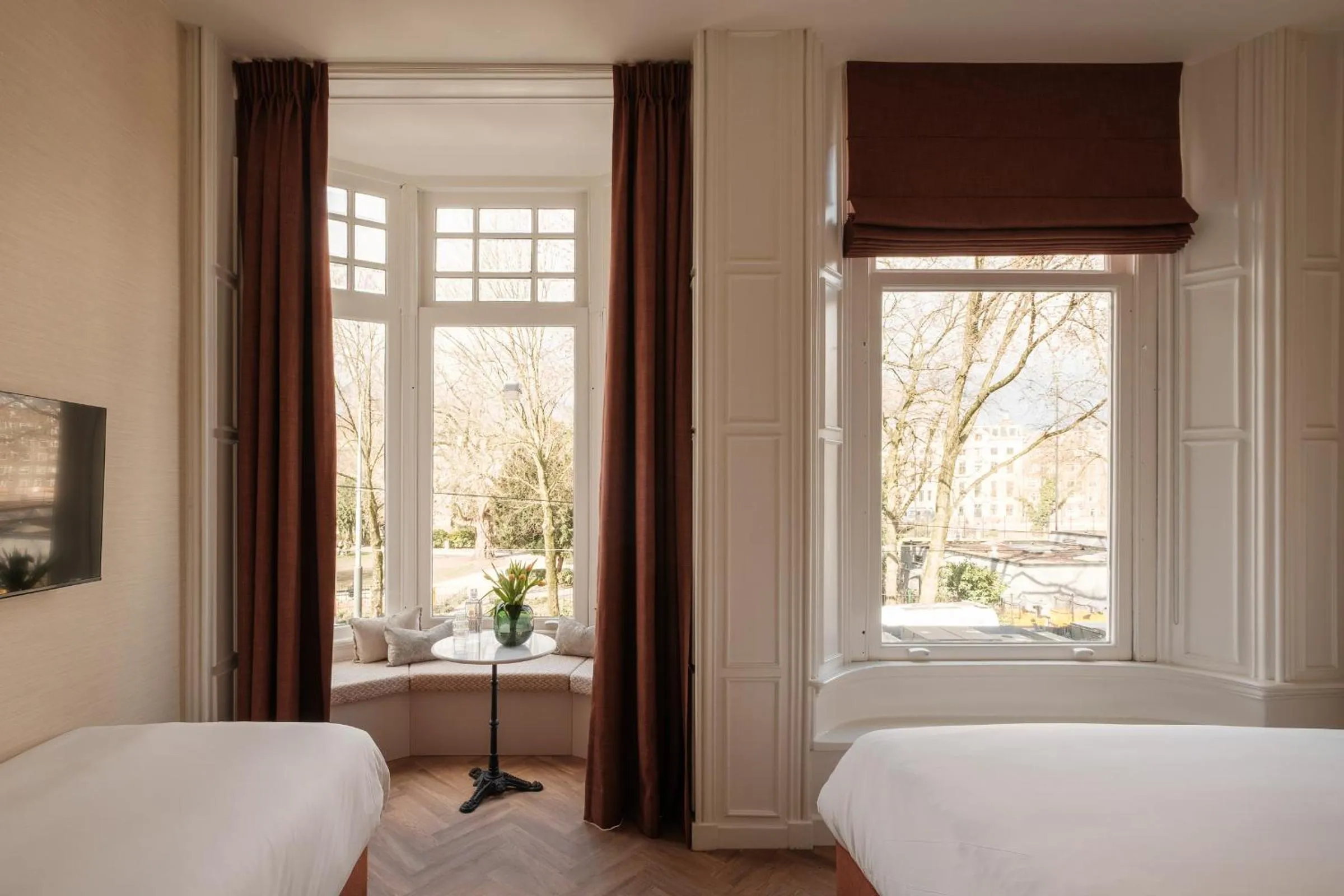 Bed in Parklane Hotel