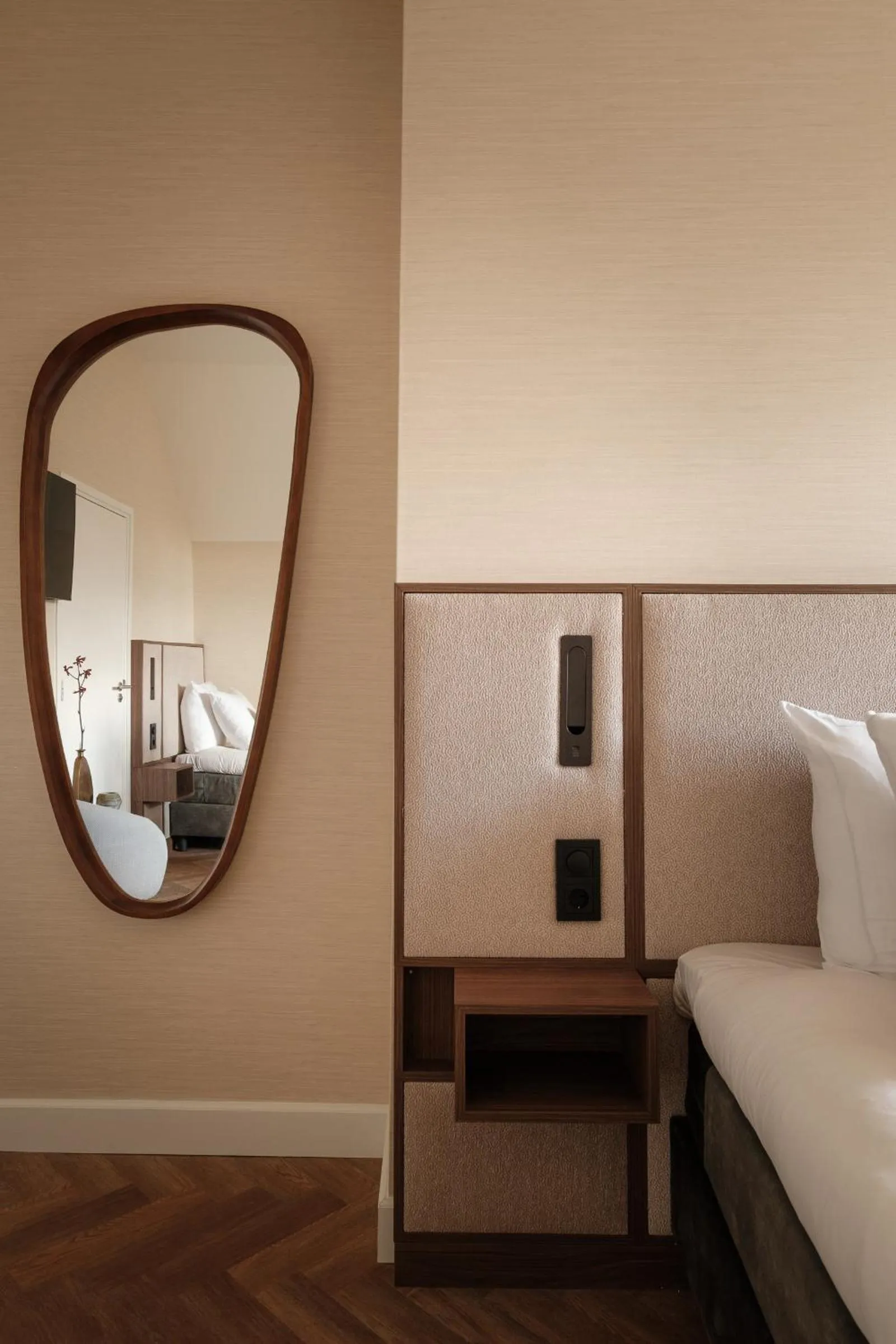 Bed in Parklane Hotel